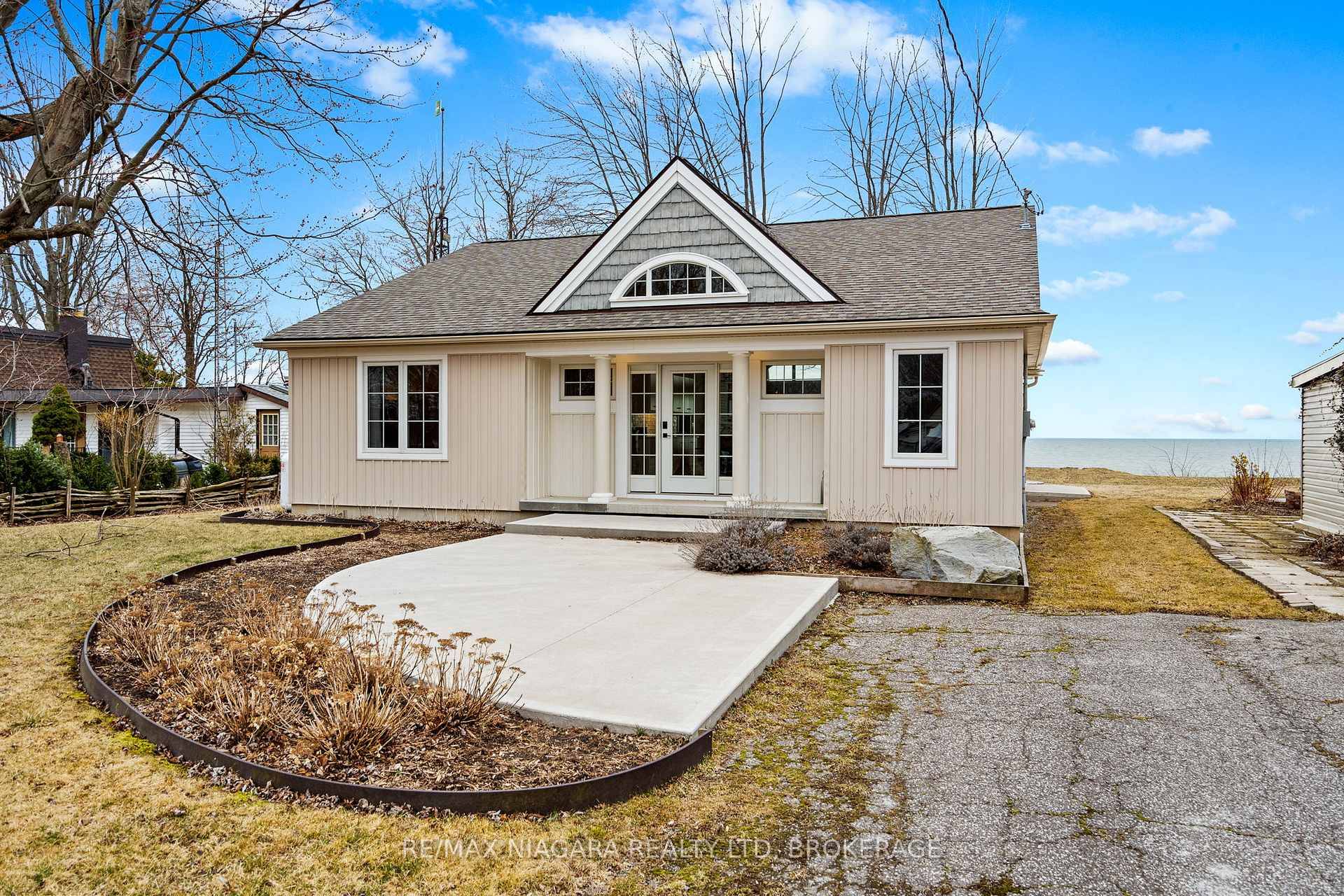 Prepared to be WOWED from the moment you open the door to this amazing waterfront bungalow sitting atop the bluffs overlooking Gull Island, along the shores of beautiful Lake Erie.