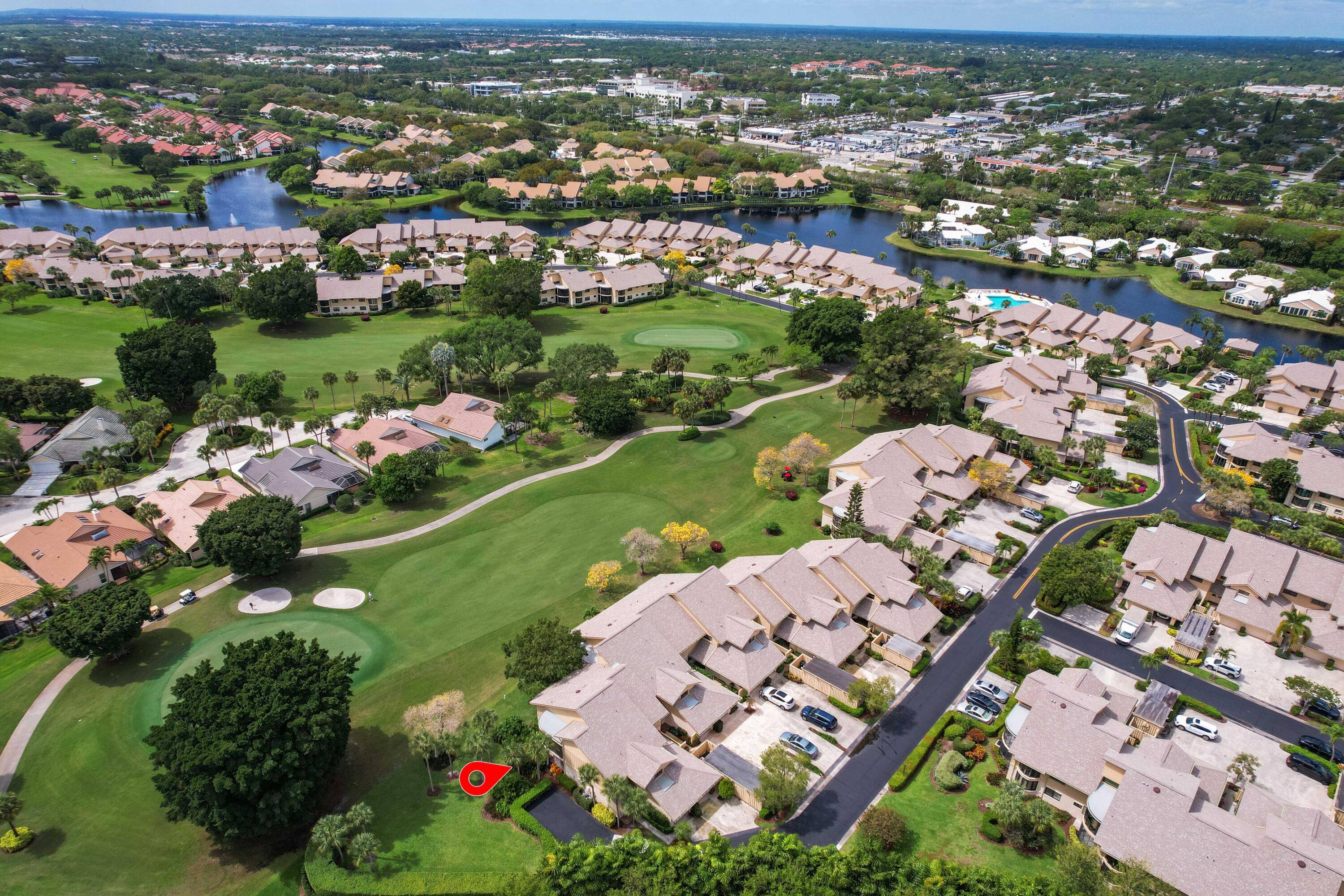 Enjoy serene, private living in this remodeled end unit on the 11th fairway.