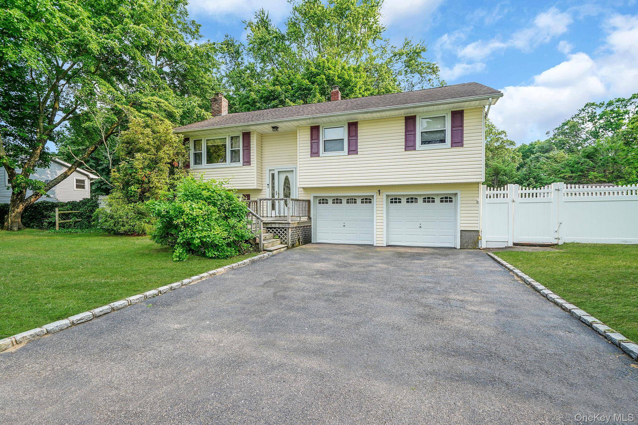 This spacious 3 Bedroom, 2 Full Bath Hi Ranch offers a versatile layout ideal for comfortable living and entertaining.