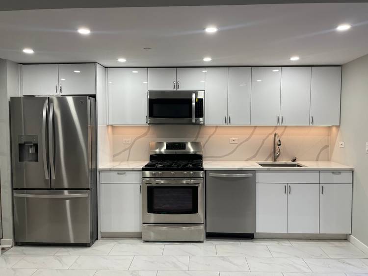 Discover this beautifully renovated triplex in the heart of Mt.