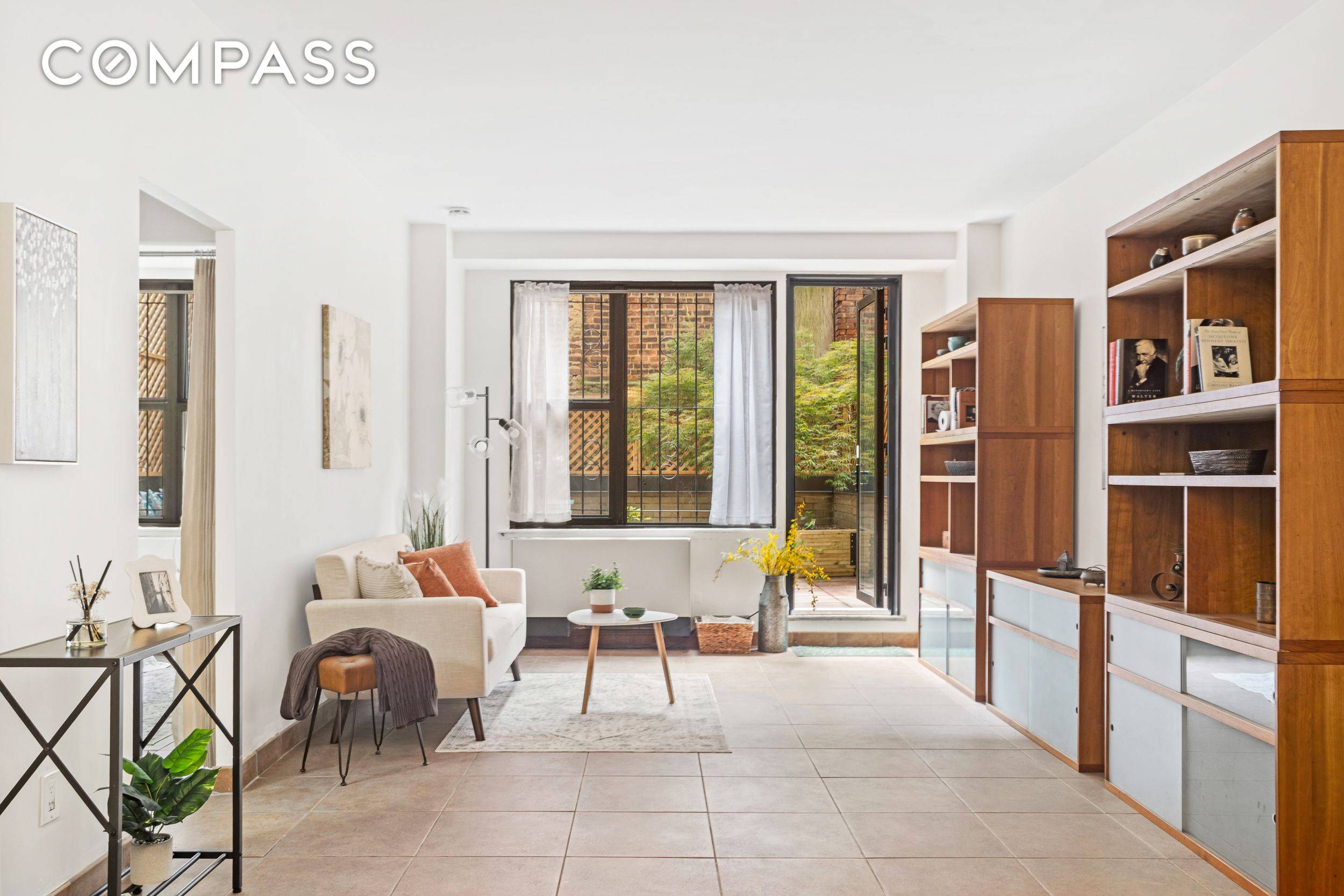 Nestled on a tree lined block on East 18th Street at its intersection with Irving Place, this lovely garden level coop apartment at Gramercy Plaza offers a south facing, private ...