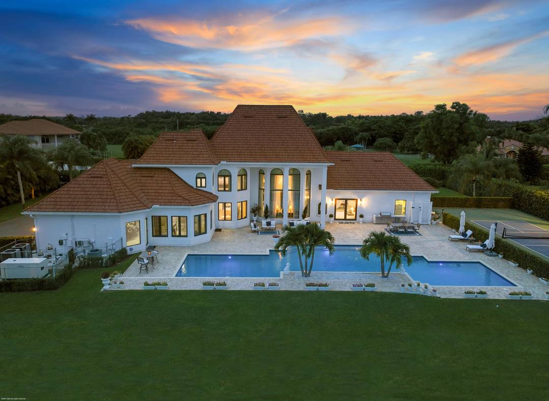 With no expenses spared, this completely renovated Southfield's of Palm Beach Polo Club Estate is situated on 5 private polo fields.