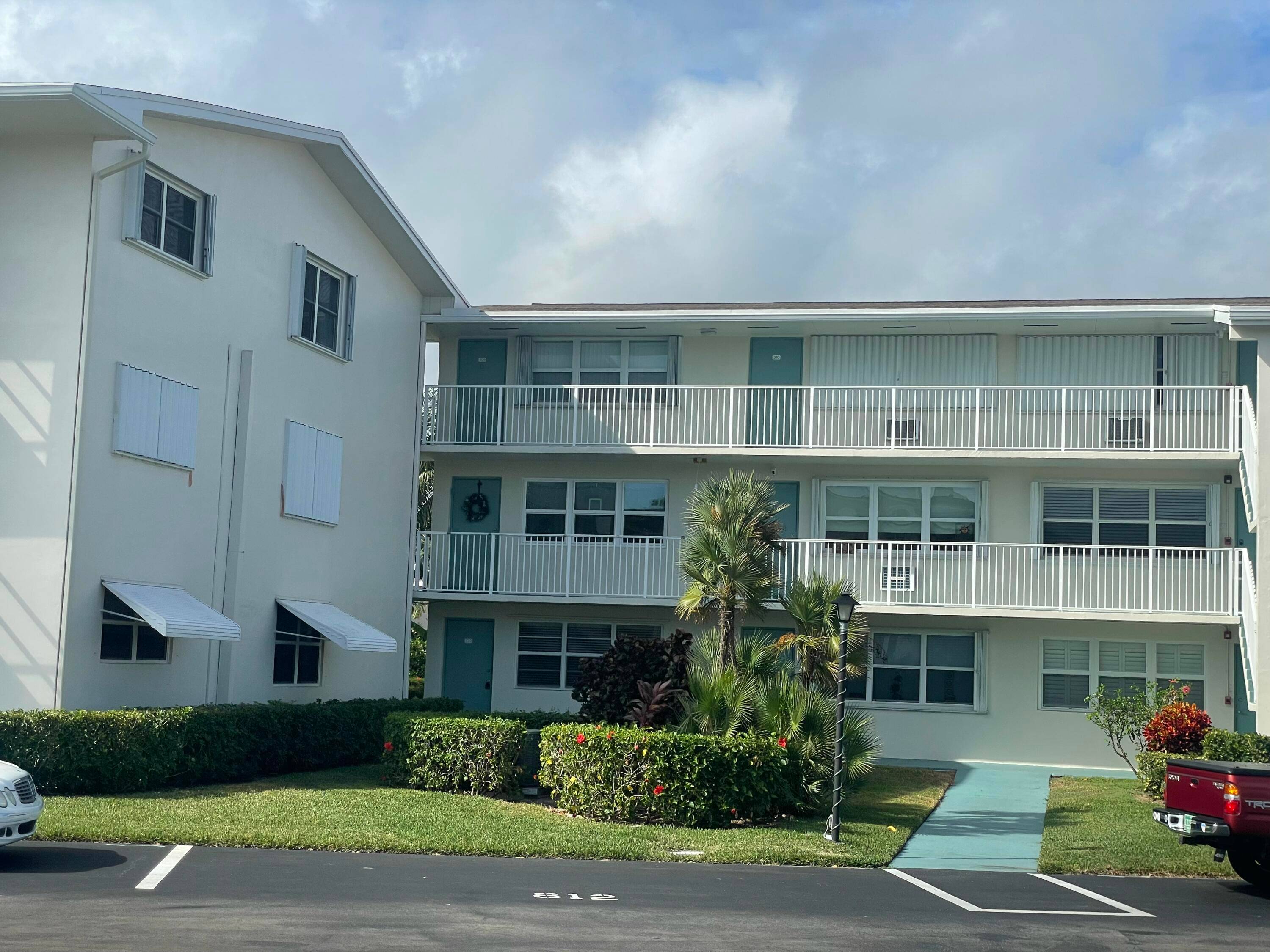 First Floor Corner Unit Condo in Coveted 55 Community !