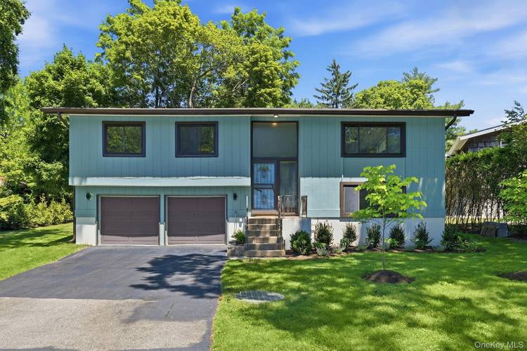 Beautifully renovated and reimagined, this sun filled Contemporary Raised Ranch offers a seamless open floor plan designed for modern living.