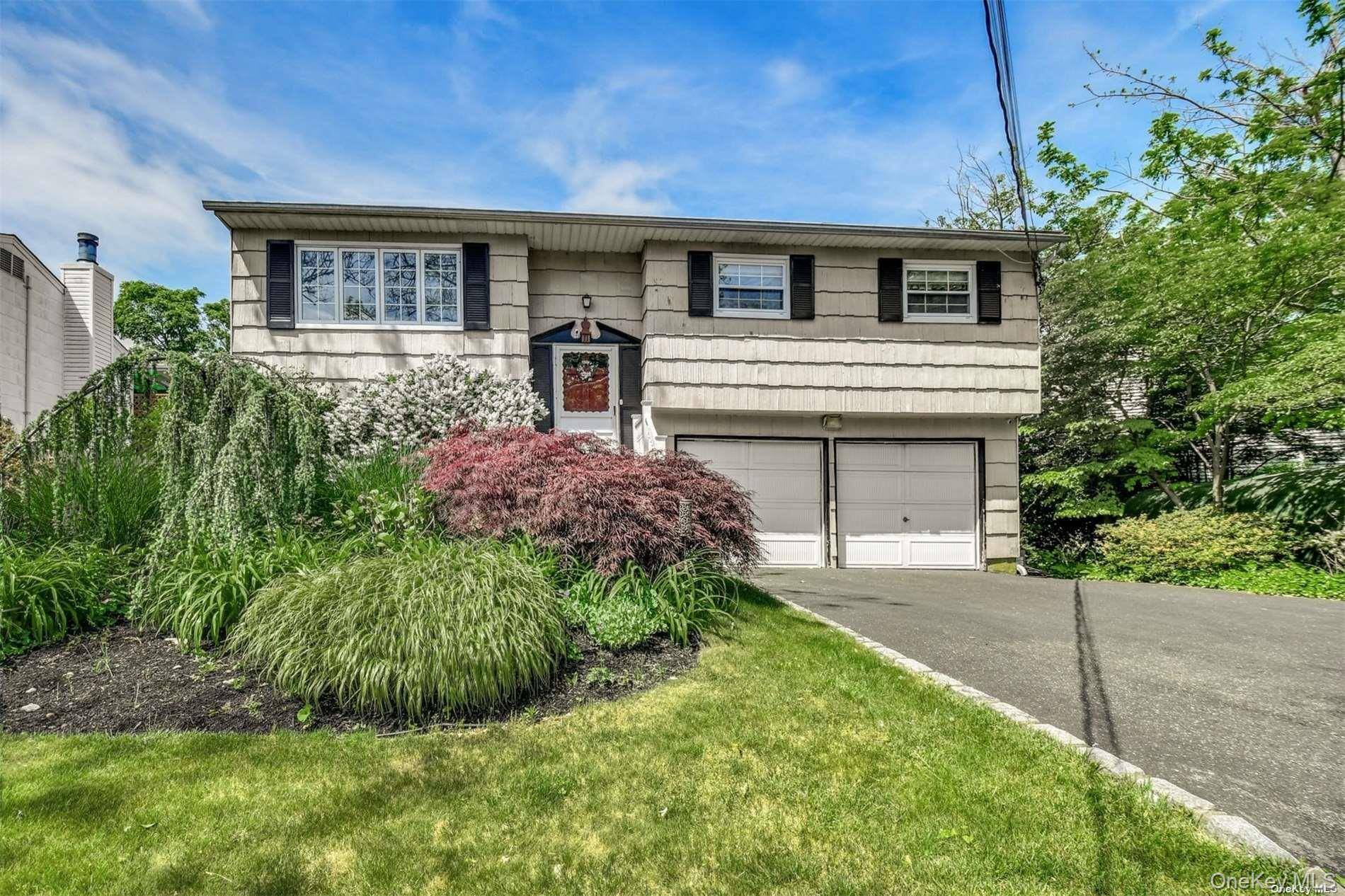 One of a kind in Huntington Station, near shops, LIRR train station and Huntington Village, located on a gorgeous tree lined block.
