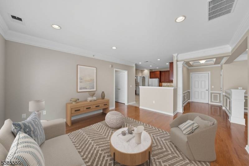 TOP FLOOR UNIT WITH DEEDED GARAGE SPACE.