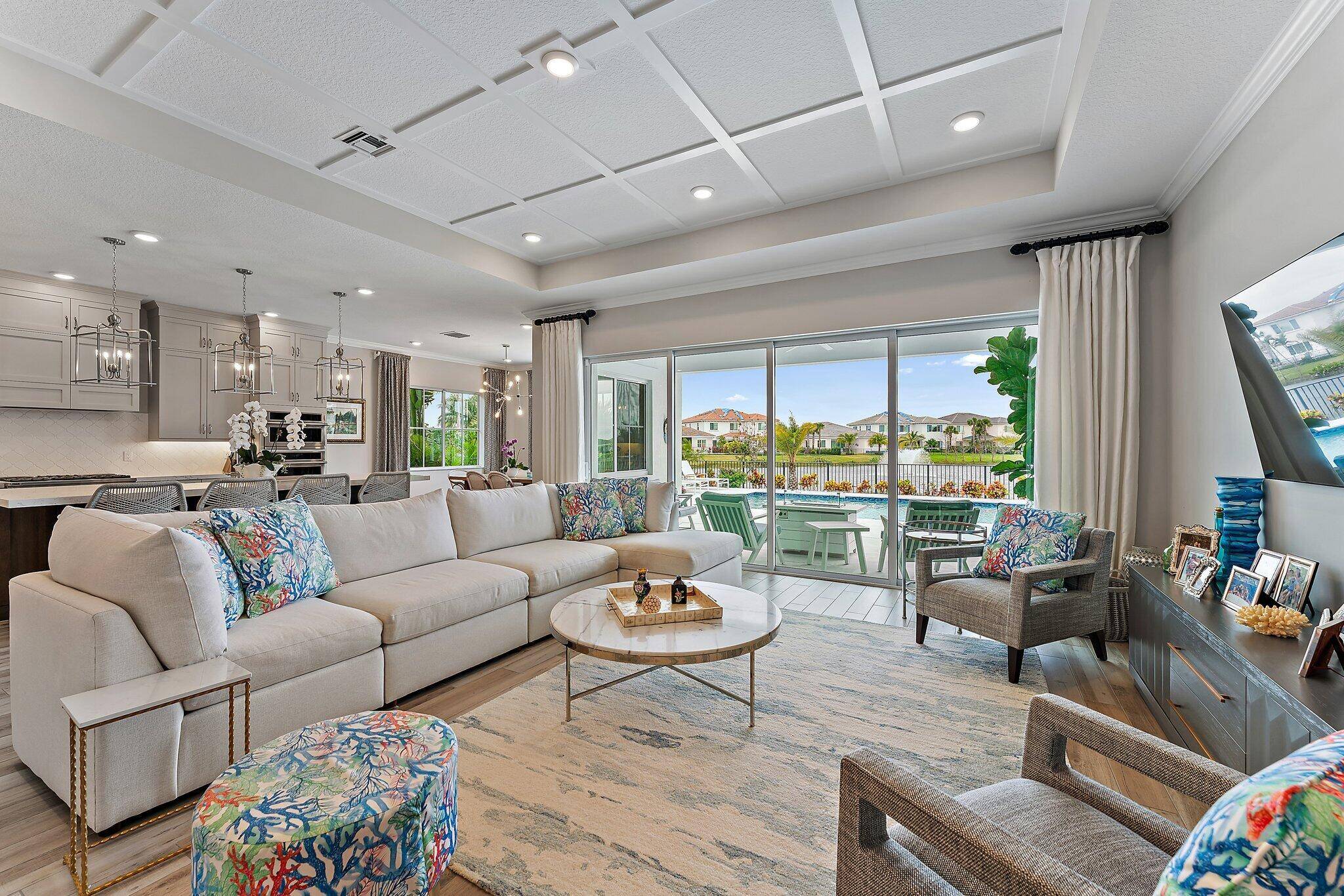 Enjoy stunning wide lake views from the back yard of this professionally decorated home built by K.