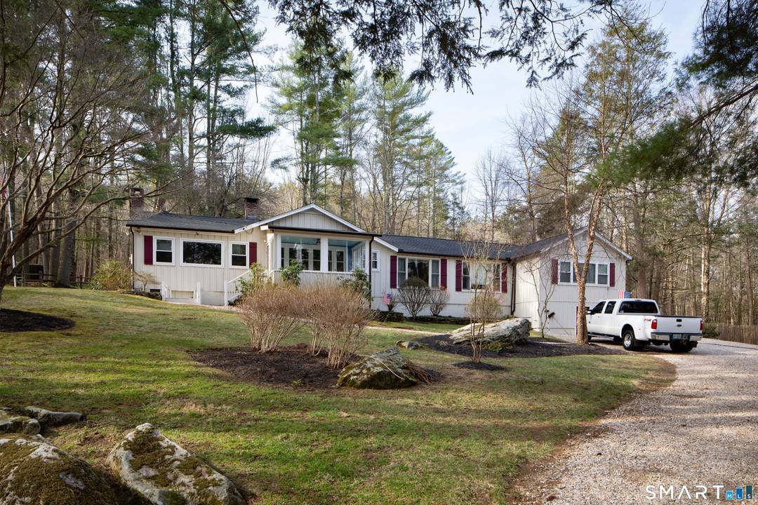 Set on 18 picturesque acres in a tranquil country setting, this spacious ranch offers privacy, charm, and convenience just moments from the covered bridge and village center.