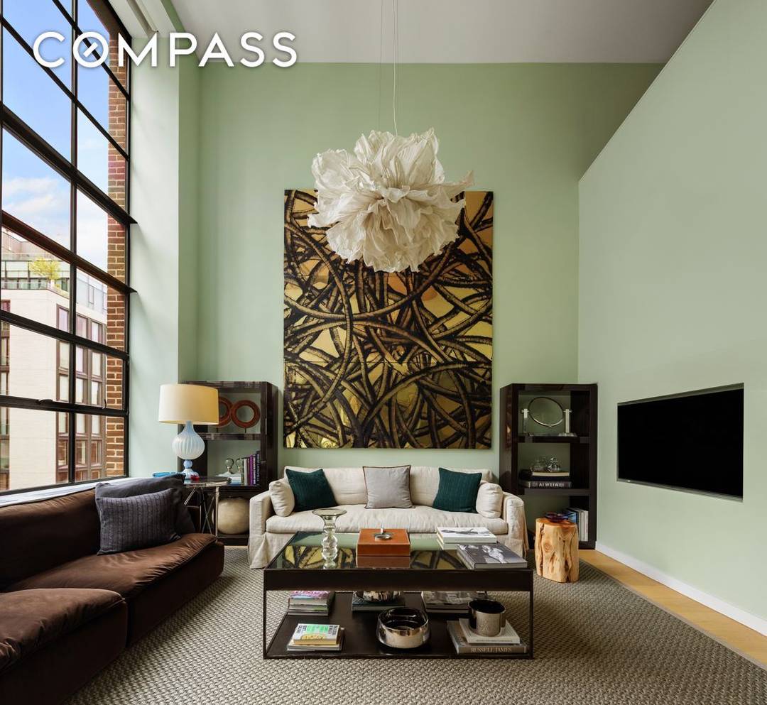 Artfully designed and masterfully finished, this exceptional three bedroom, three and a half bathroom duplex with soaring double height ceilings is now available in the heart of prime West Chelsea.