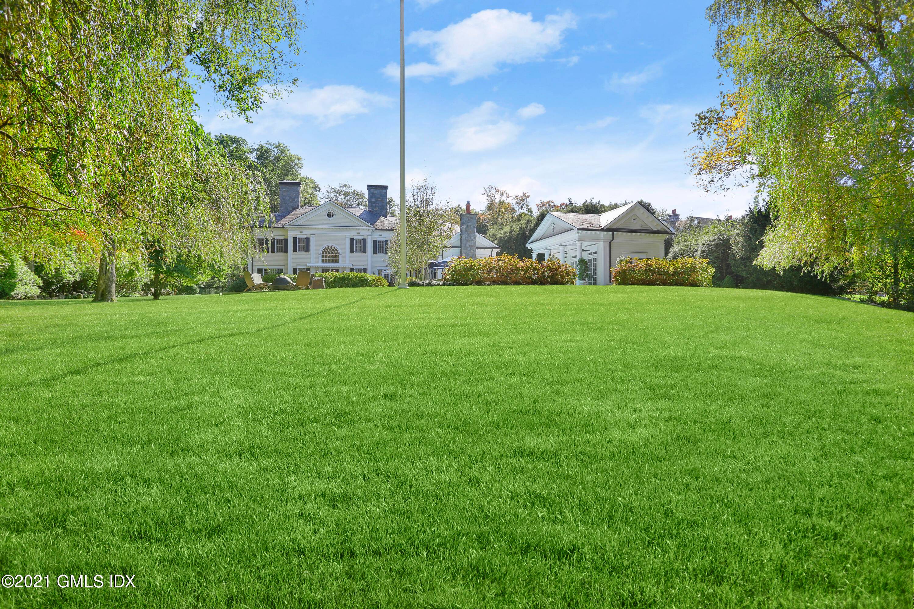 Exquisite Georgian showcases exceptional architectural details high ceilngs.