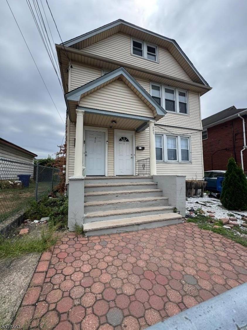 Very large two family located in desirable section of town.