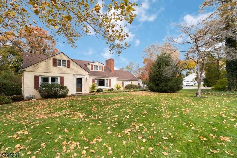 Classic Convent Station expanded Cape Cod, ideally located in one of Morris Township's most desirable neighborhoods.