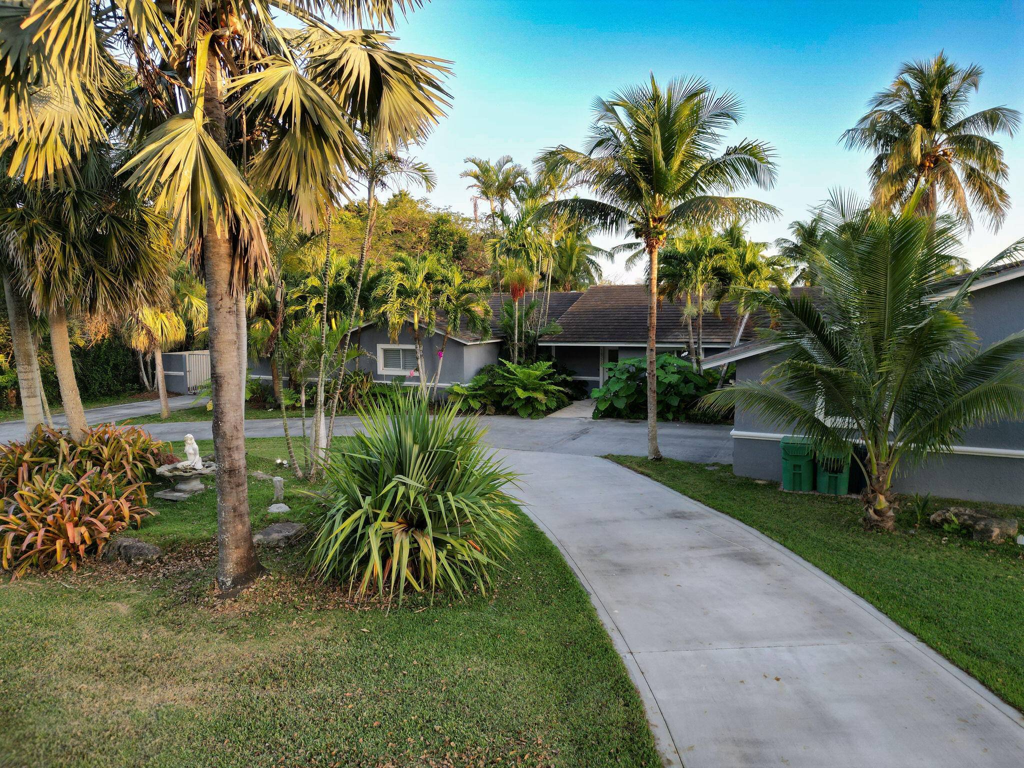 Price Improvement ! Private tropical retreat on nearly 1 acre w exotic fruit grove, 5BR 3.