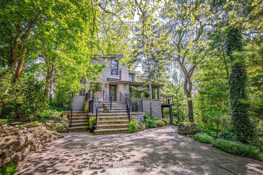 Nestled on an extraordinary nearly 1 2 acre ravine lot in coveted Lorne Park is this resort inspired contemporary residence surrounded by breathtaking natural beauty.