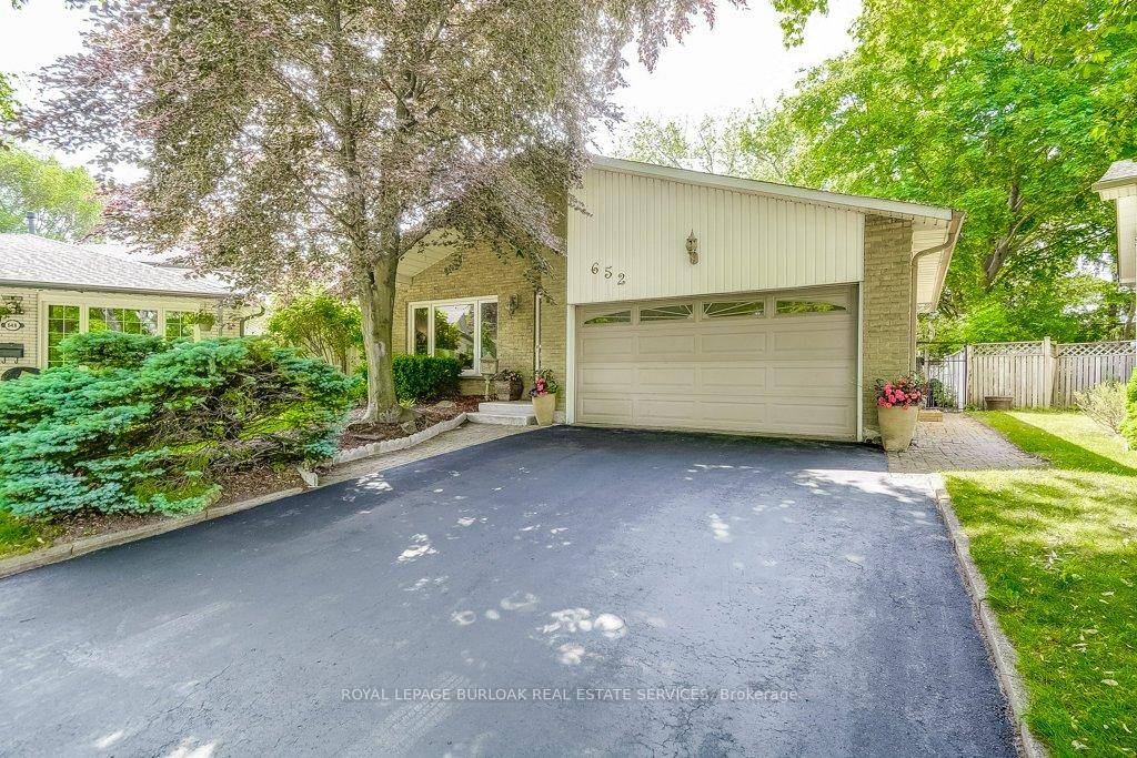 Located on a quiet crescent and set on a large, private lot, this is the perfect family home.