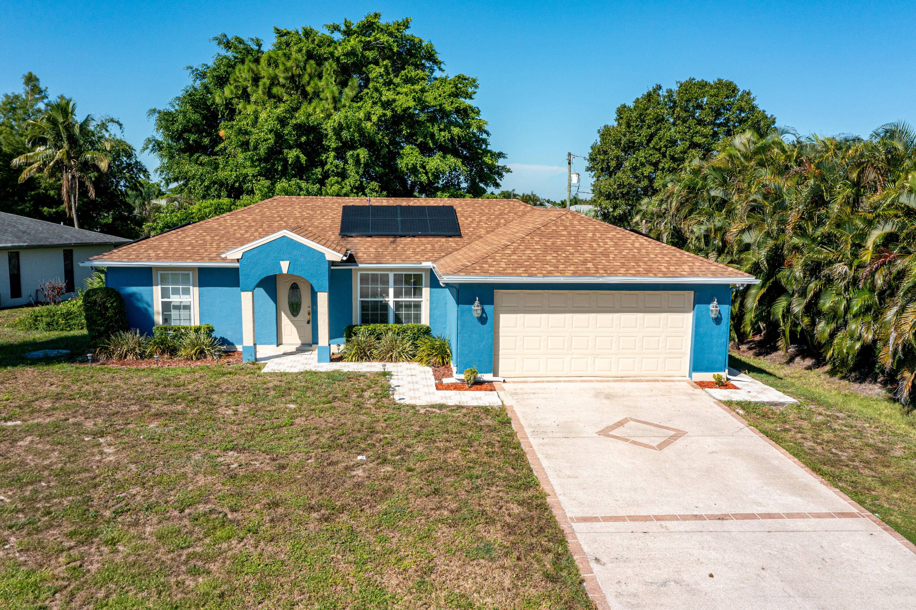 Updated CBS home with solar panels paid off at closing.