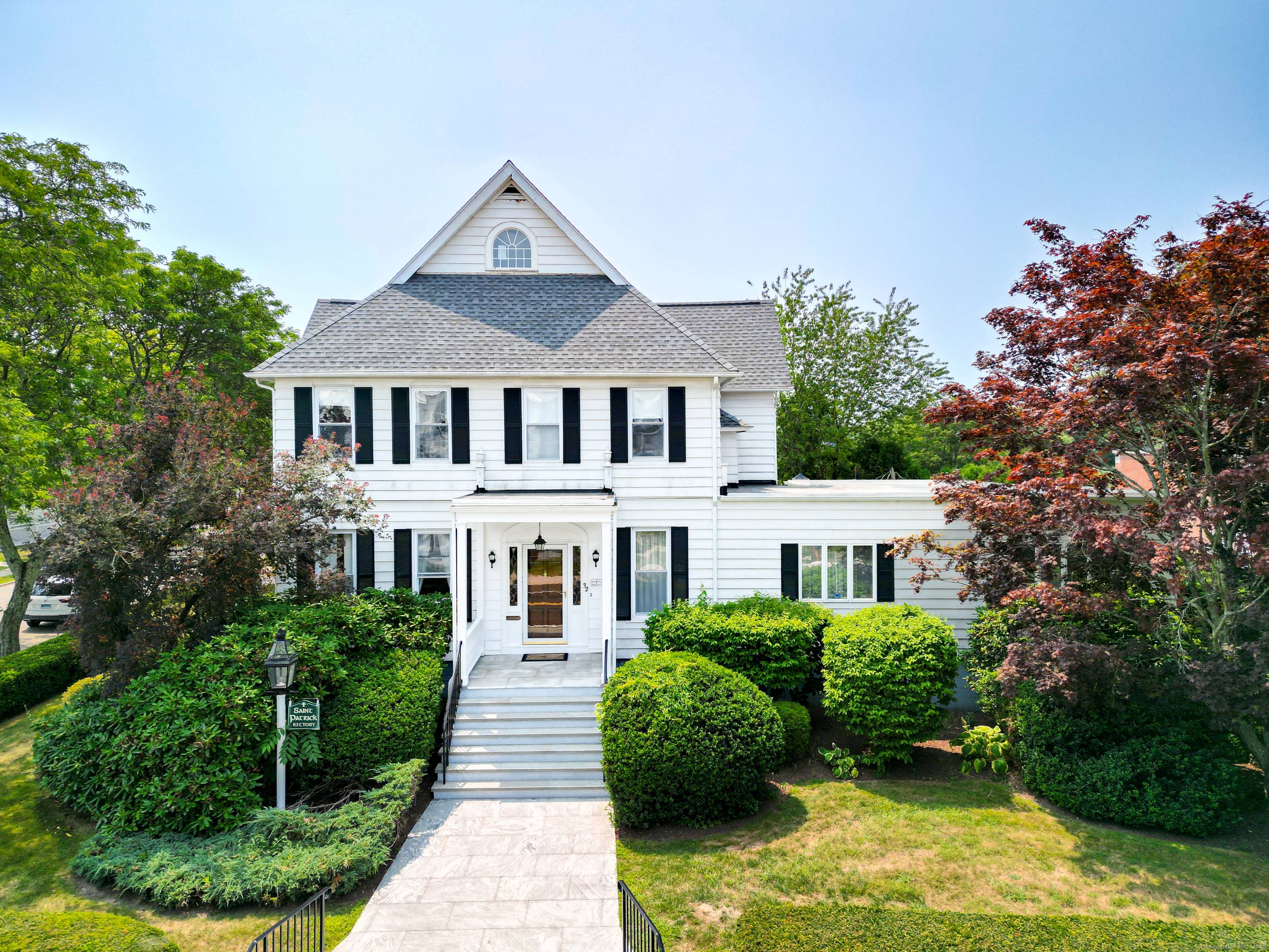 Gracious 1920s Colonial in the Heart of Downtown Mystic.