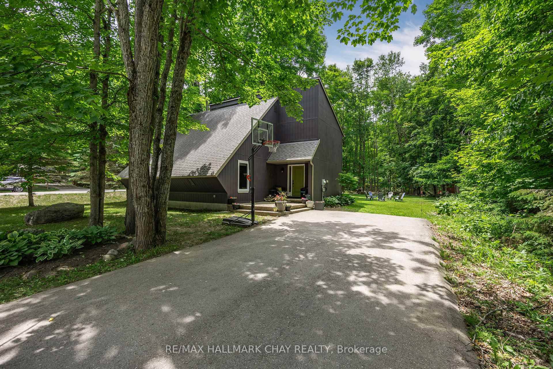 Welcome to 26 Cherry Trail where nature, privacy, and comfort converge in one of Oro Medonte's most sought after communities.