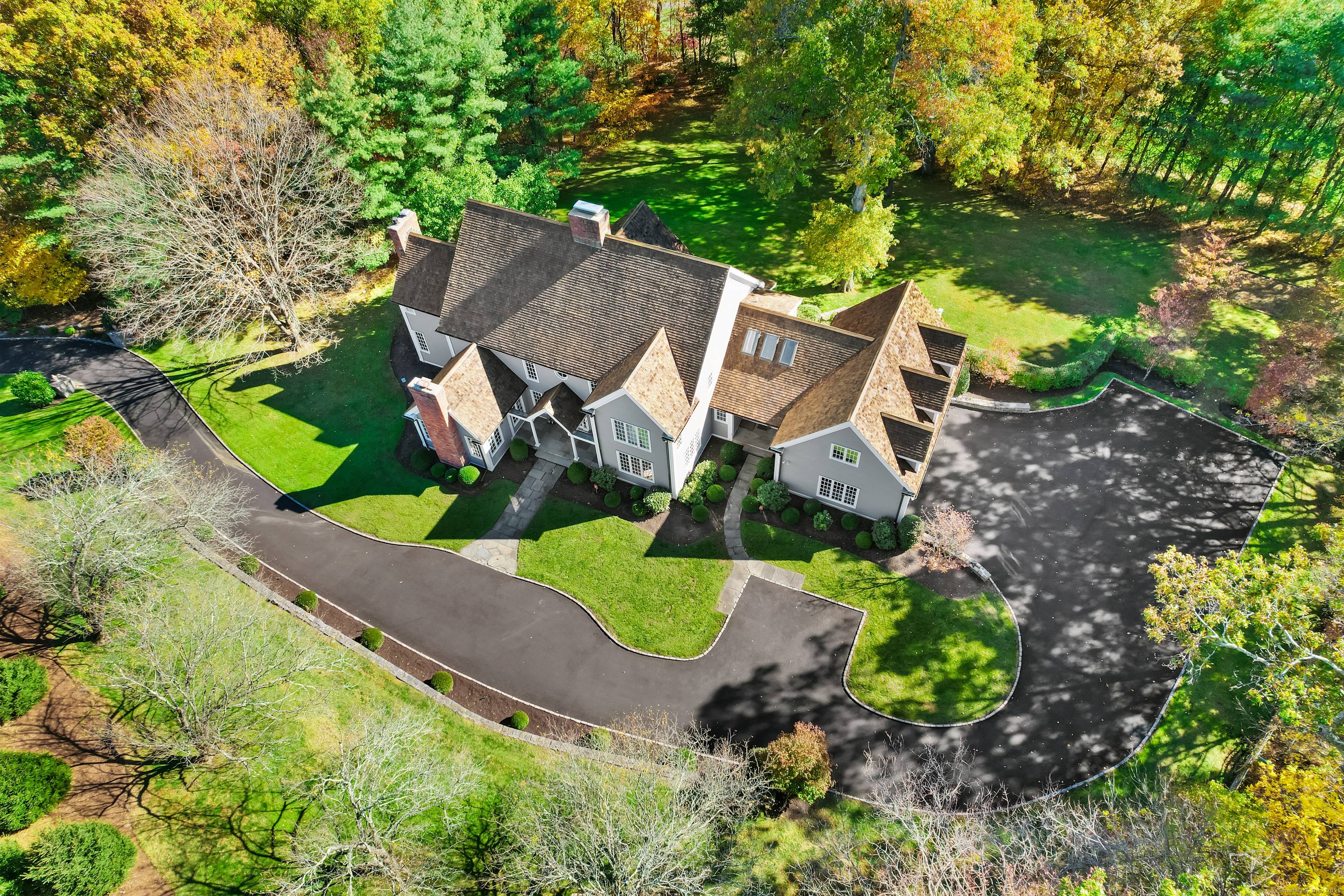 Welcome to 30 Soundview Farm Road a timeless Nantucket style colonial nestled at the end of a serene cul de sac in one of Westons most desirable location, just moments ...