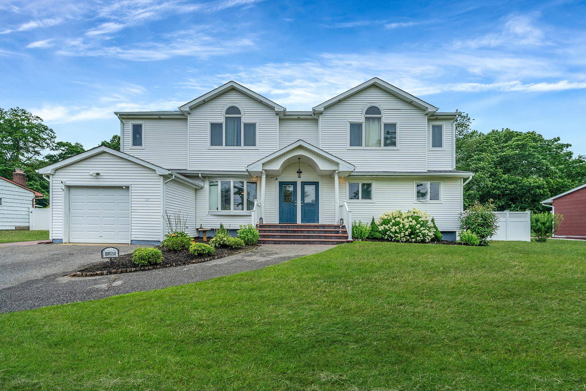 Welcome to 39 Aron Dr. This spacious expanded ranch offers an impressive 3, 800 square feet of living space, thoughtfully designed for comfort, function, and flexibility.