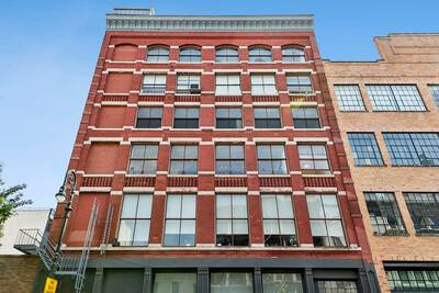 393 West Broadway, Unit 4WB Welcome to this exceptional SoHo corner loft, a true rarity that combines volume, light, and character in one of downtown's most coveted addresses.