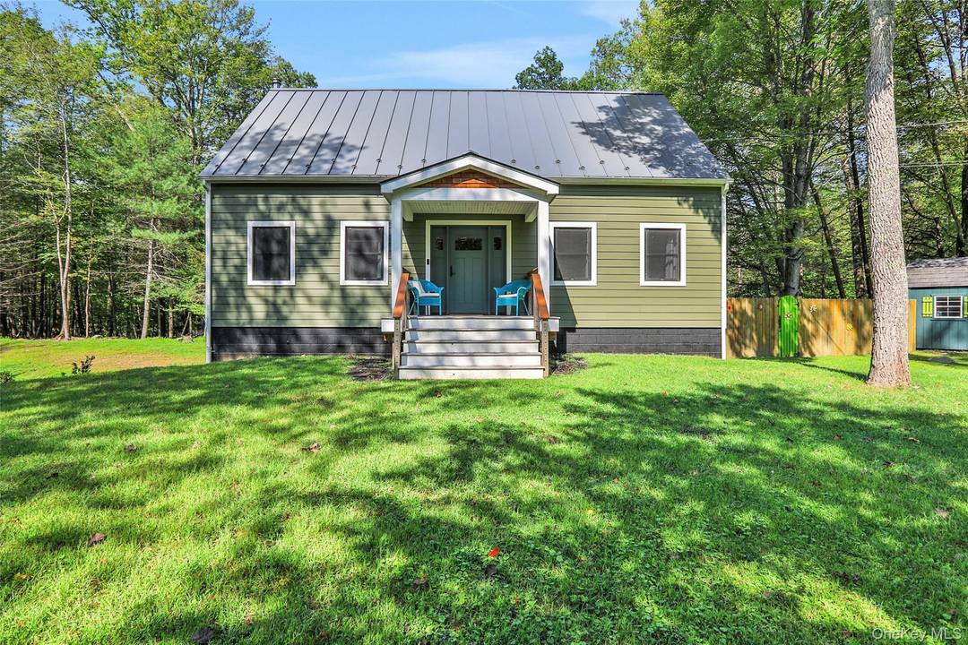 Escape to this beautifully updated 3 bedroom, 2 bath Cape home located in the heart of Olive Bridge.