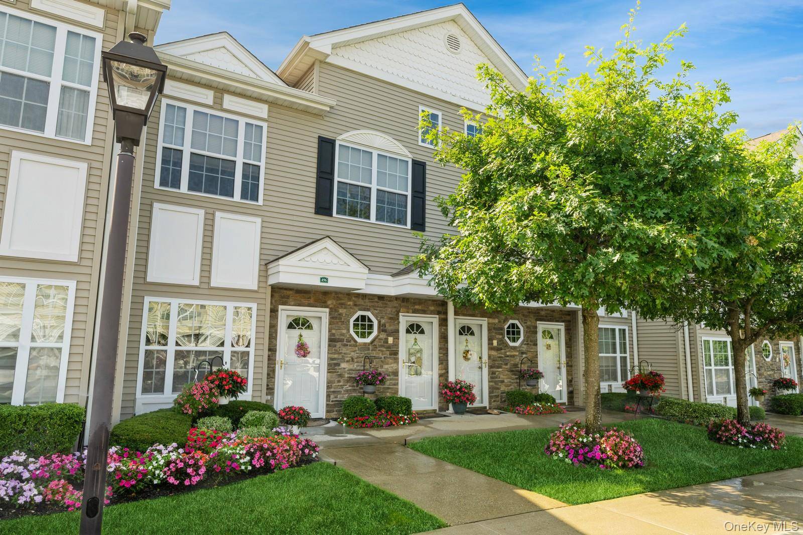 Step into Luxury, Convenience and Community with this beautifully maintained condo at The Seasons of East Meadow which is an over 55 Complex with 24 hour security.