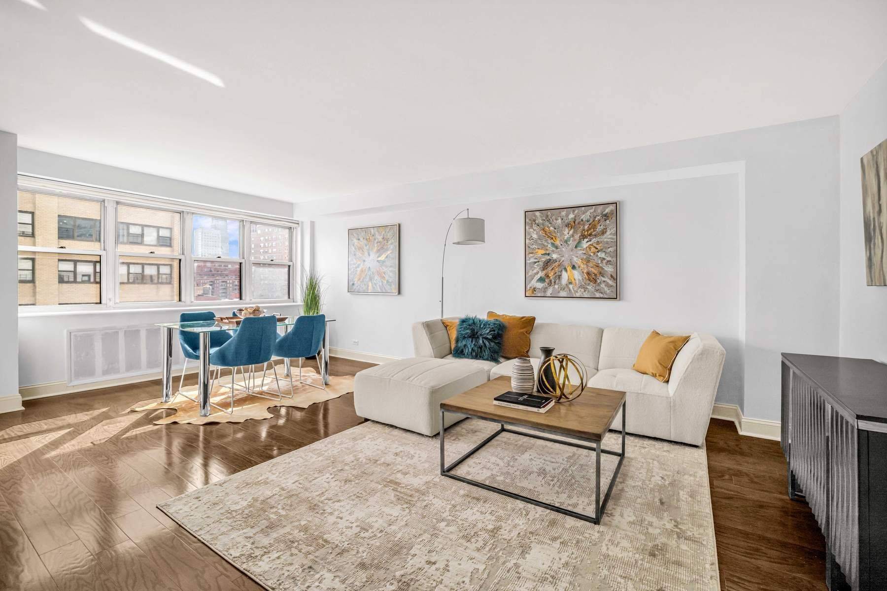 Apartment 21G is flooded with sunlight from the Southern and Eastern exposure with panoramic city and its Empire State Building views.