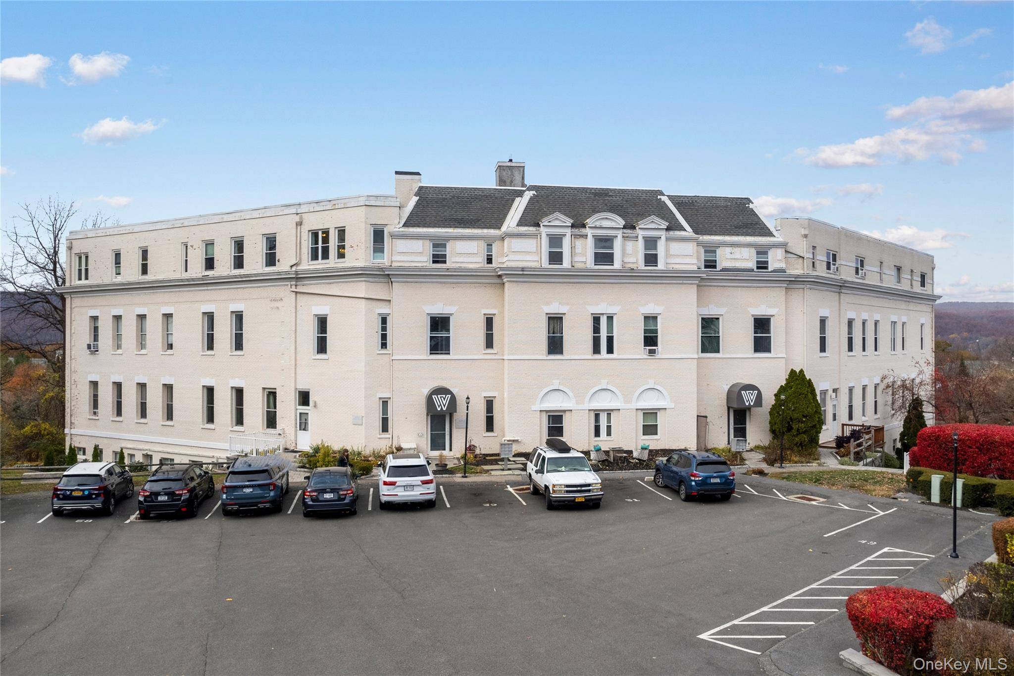 Step into this stunning loft style duplex, where soaring ceilings and seasonal Hudson River views create an airy, inviting atmosphere.
