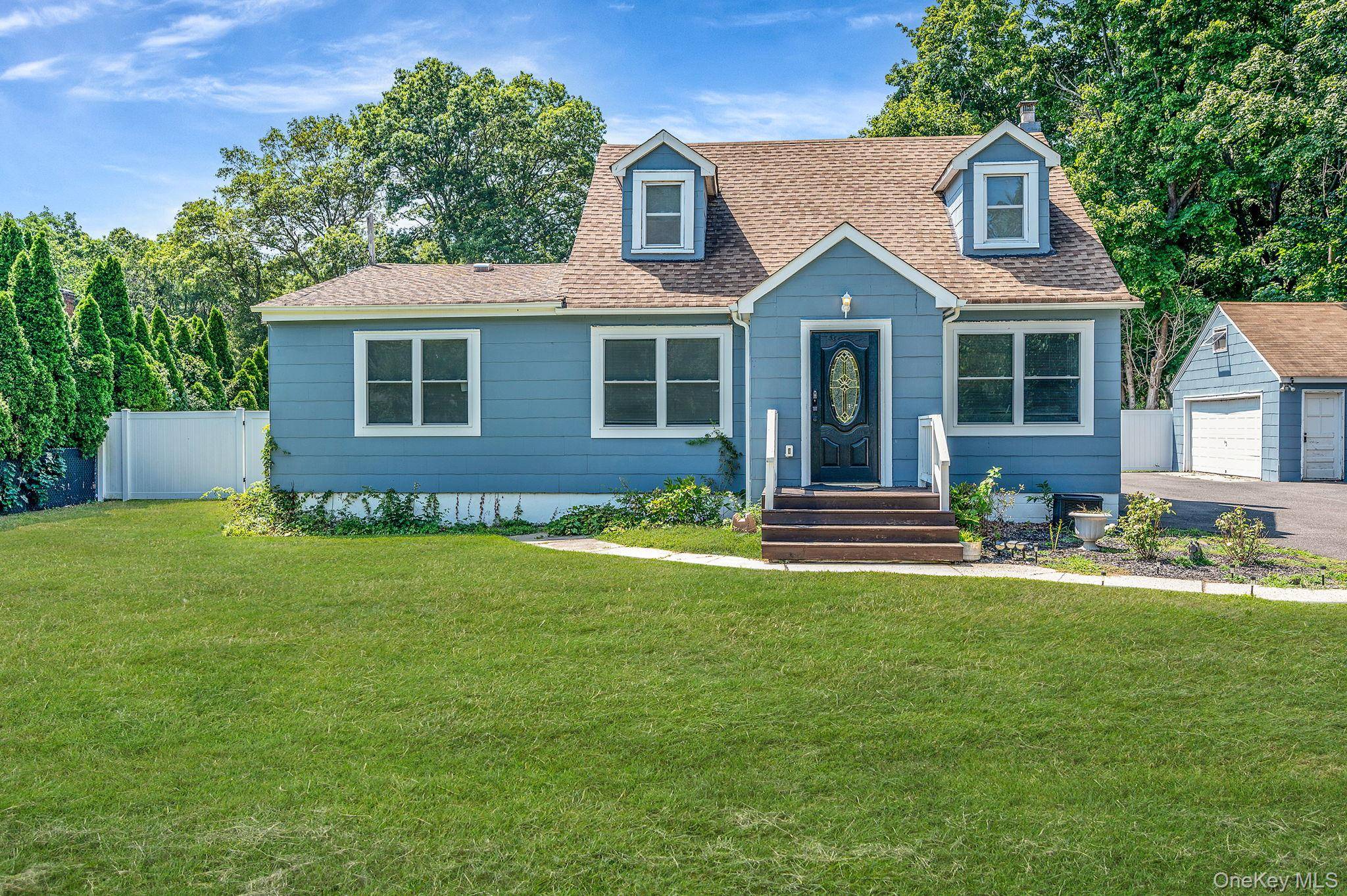 Welcome to this charming 4 bedroom, 2 bath Cape, perfectly situated on a spacious half acre lot.