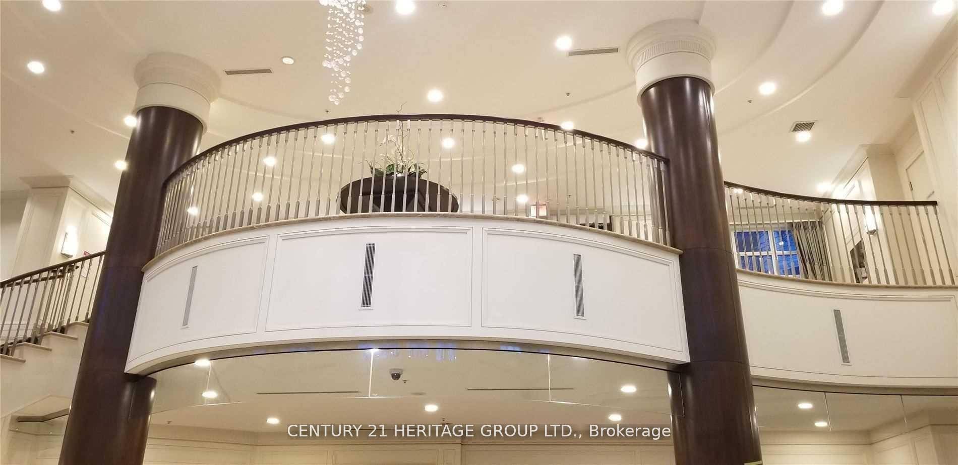 Luxury and sought after Aria Condos, Hardwood throughout, backsplash, large balcony, indoor pool, theater, 24 hour concierge, guest suites, lots of visitor parking.