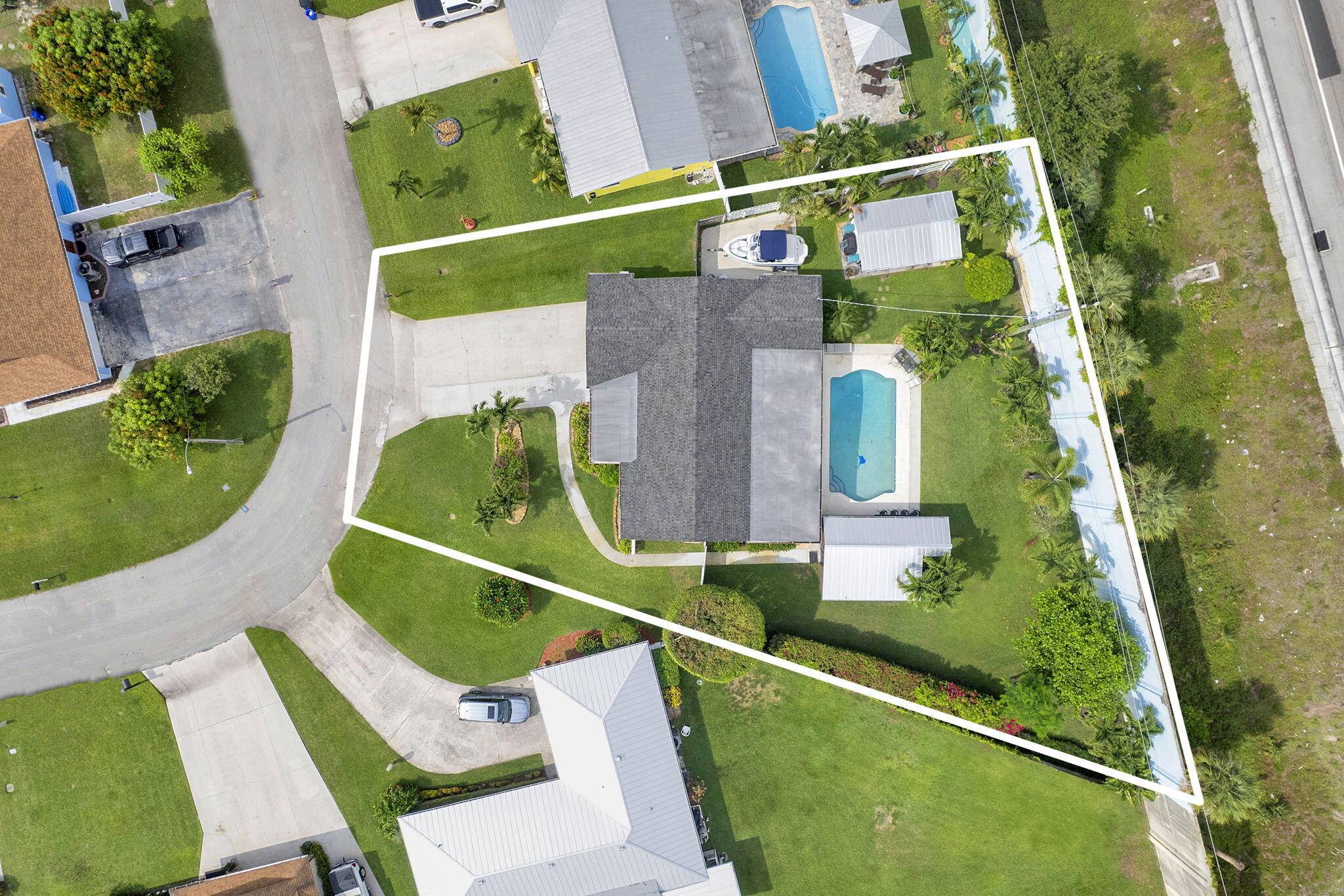 Bring your boat, RV, trailer, golf cart, pool floats and drink with an umbrella in it because you're never going to want to leave this property !