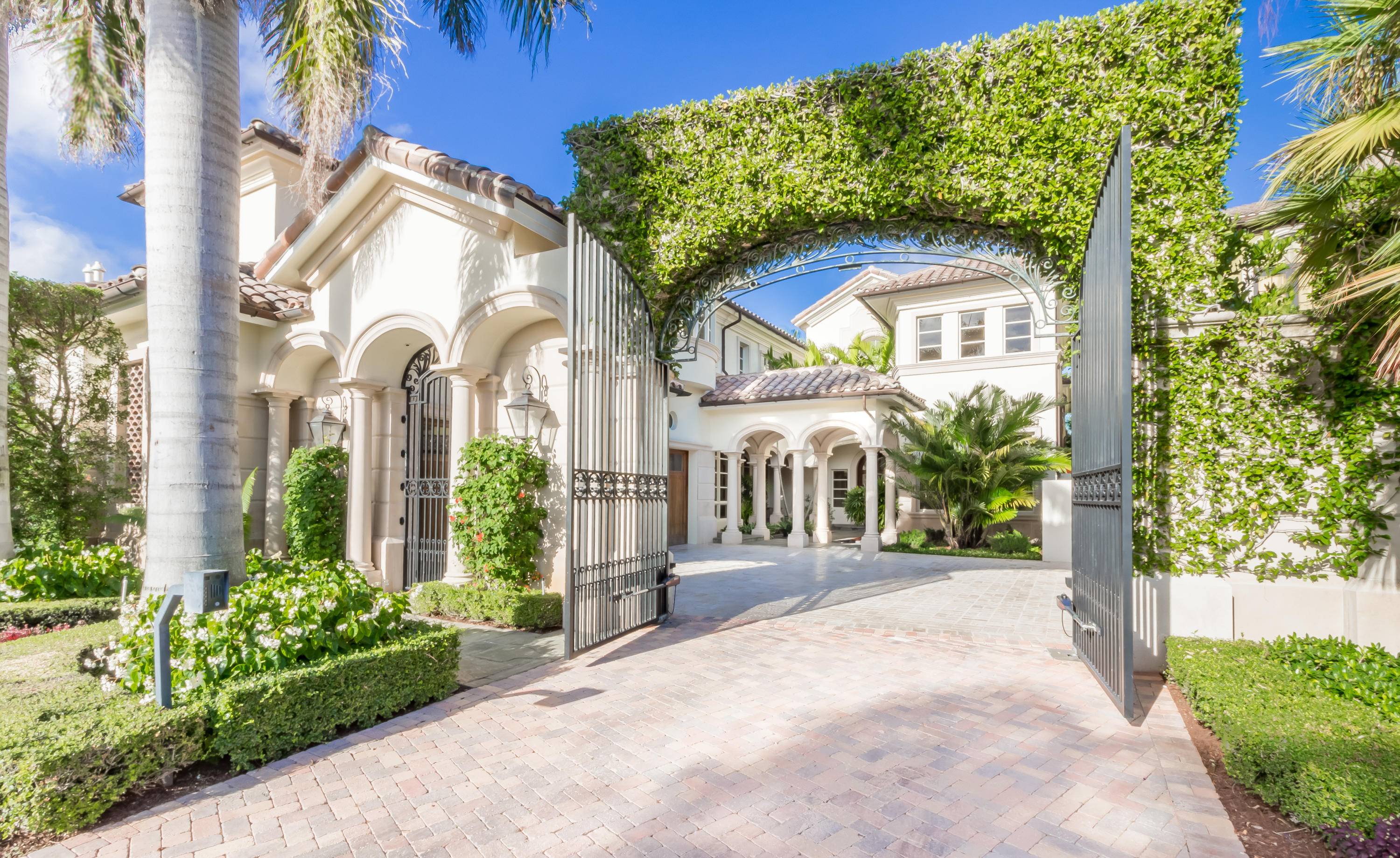 Live in the spectacular gated community of Mizner Lake Estates, an exclusive enclave in Boca Raton within the prestigious Boca Raton Resort Club.