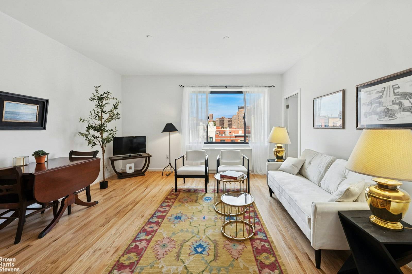 Two bedroom penthouse with a private two story roof deck in a Central Harlem condo.