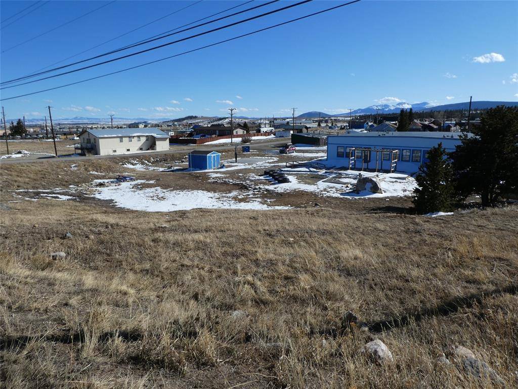 UNIQUE OPPORTUNITY in Fairplay with Park County offices and South Park Ambulance across the street and next door to Boys and Girls Club.