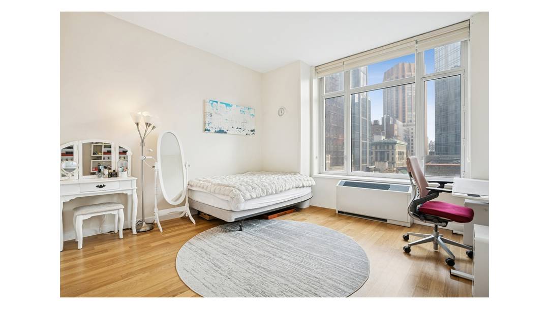 Spacious full sized 2 bedrooms with 2 full bathrooms in luxurious condominium unit in the heart of Midtown of Manhattan on Fifth Ave, with the view of Empire State Building ...