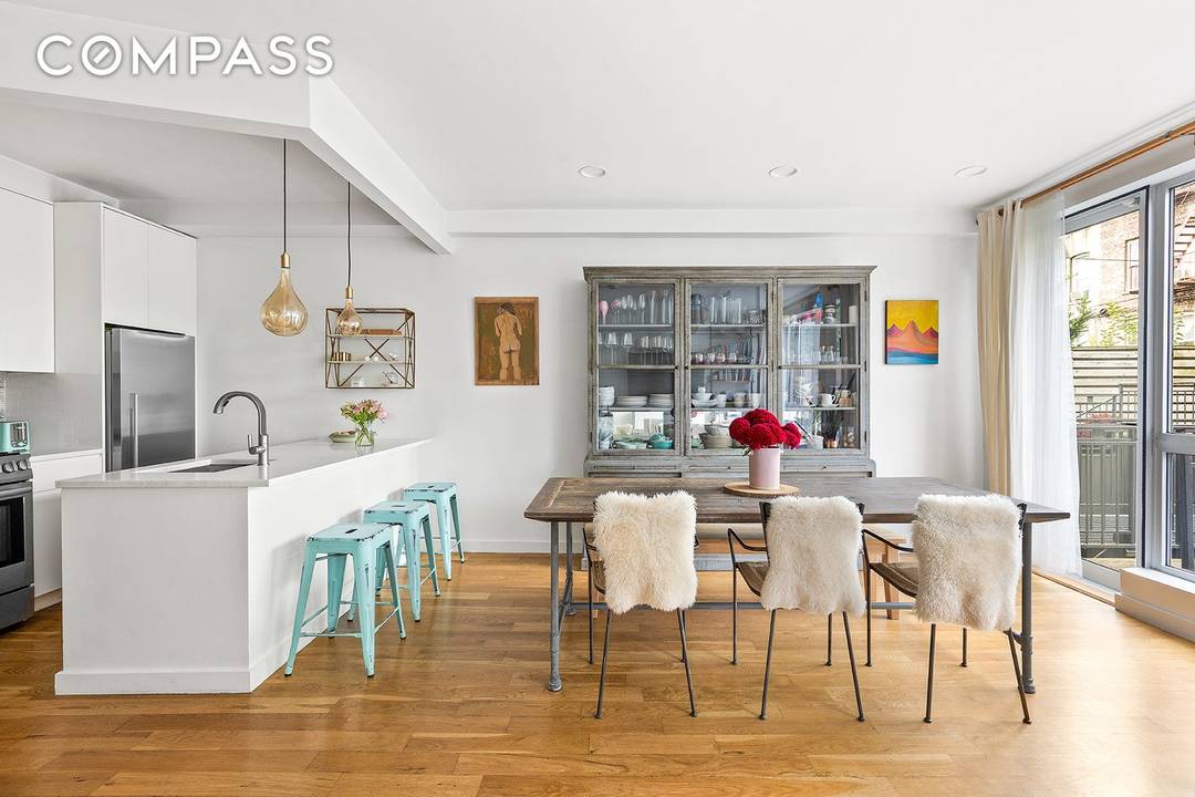 Welcome to 305 Cooper Street, Unit 1B a brilliantly reimagined duplex offering nearly 1, 900 square feet of refined indoor and outdoor living.