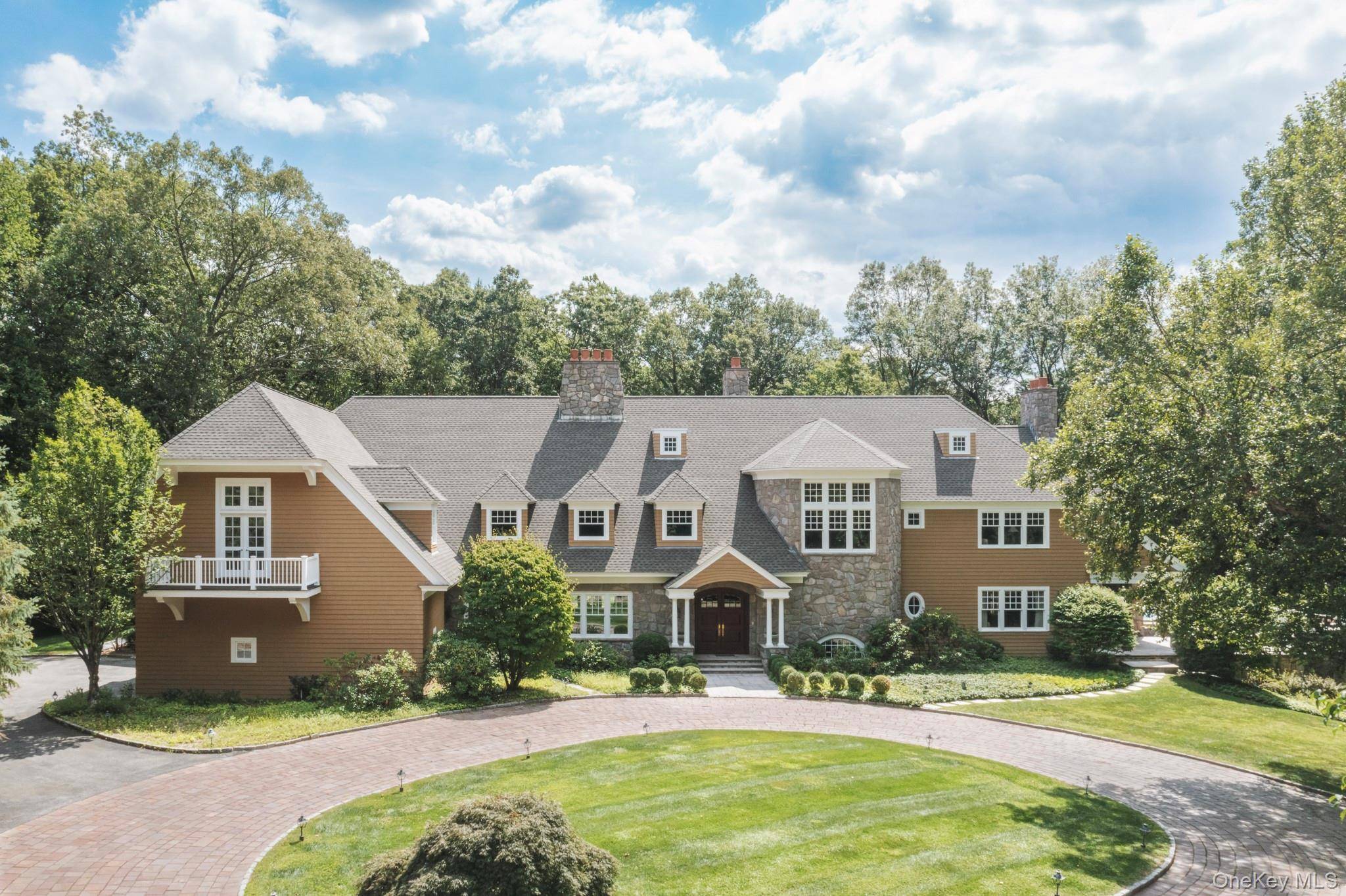 Just one hour from Manhattan, this extraordinary Bedford Corners estate offers the ultimate in privacy, scale, and resort style living.