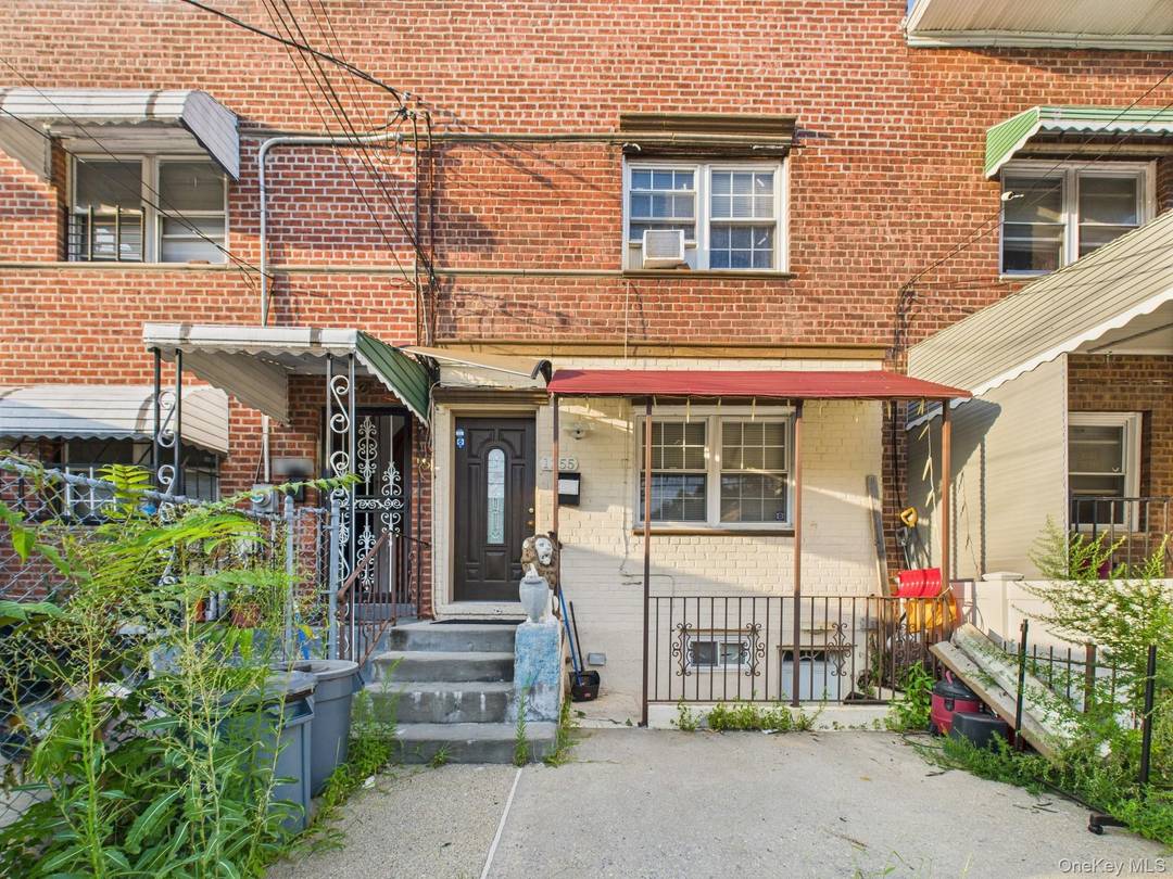 Single Family Home, brick, 3 bedrooms duplex over a finished basement studio apartment with parking and backyard.