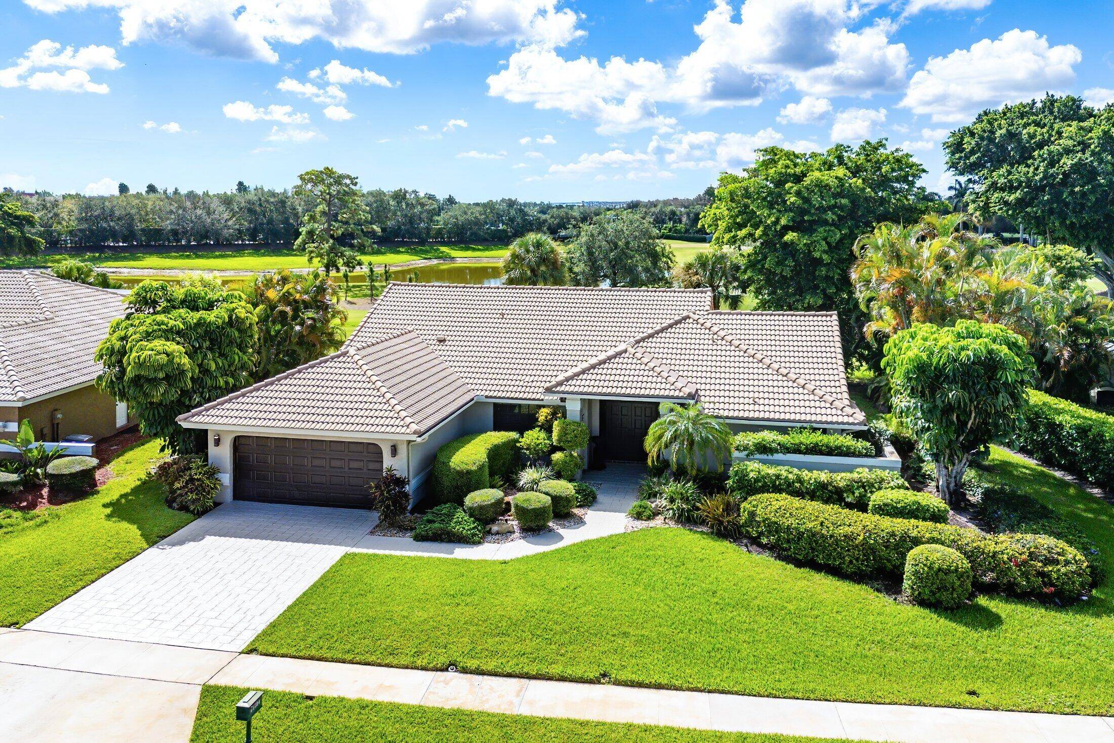 Set in the prestigious Boca Woods Country Club, this meticulously maintained 3 bedroom, 2 bath home offers a perfect blend of elegance and functionality offering privacy and comfort for both ...