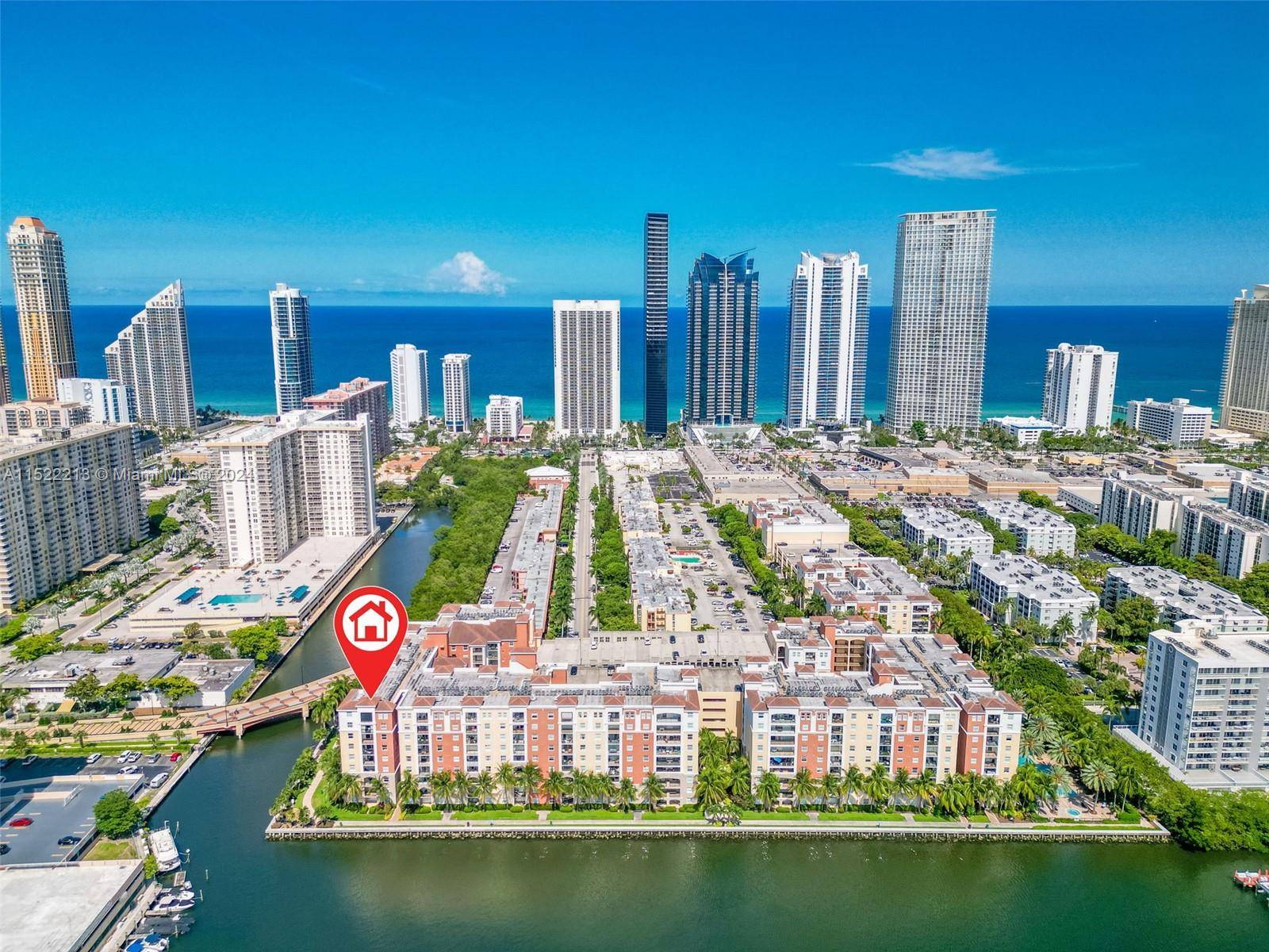 Medditerian style Bayfront furnished condo, located just minutes walking distance to the beach, supermarkets and two biggest playgrounds of prestigious location of Sunny Isles.