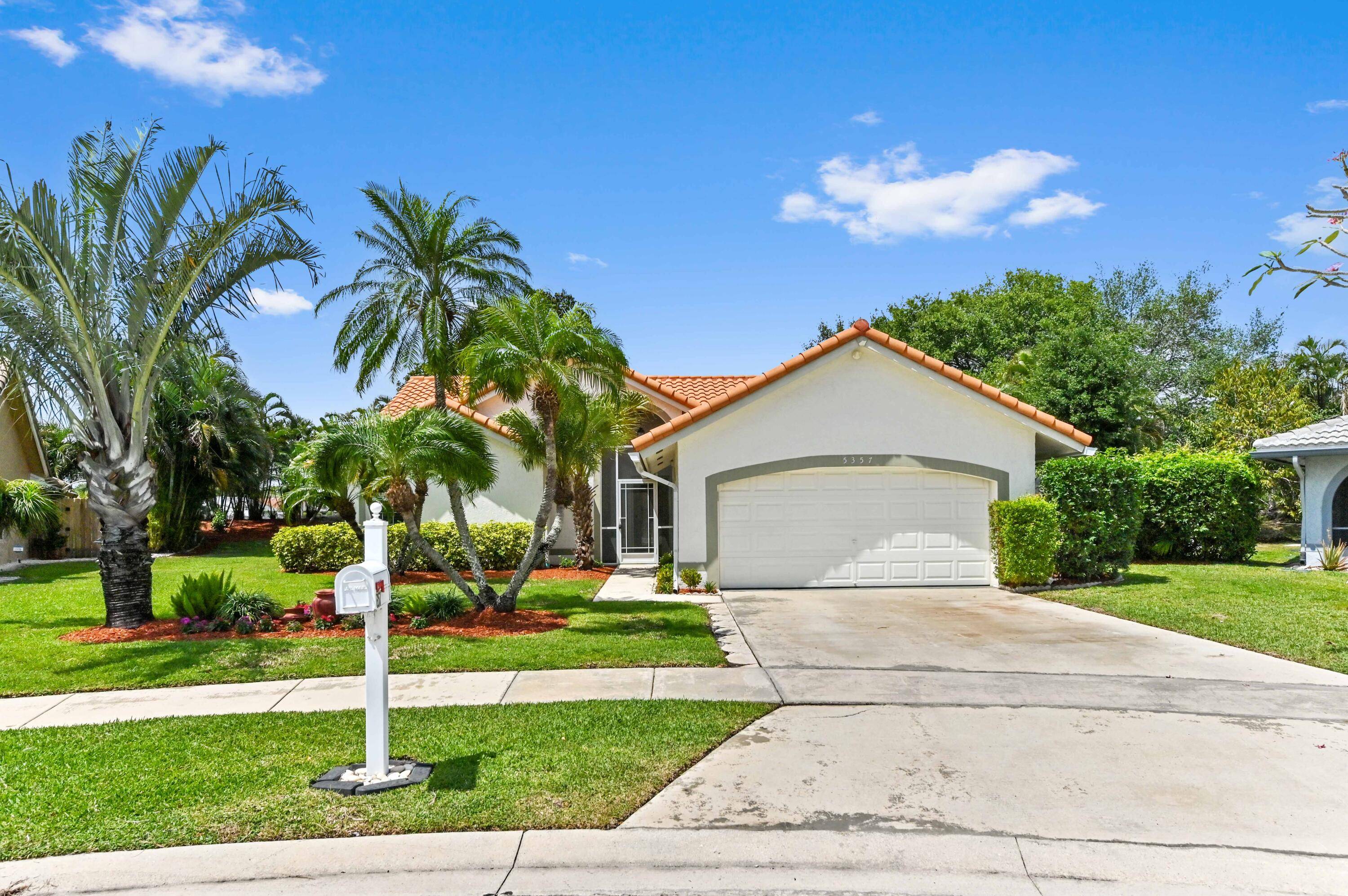 Welcome to this beautifully maintained 3 bedroom, 2 bathroom waterfront home nestled on a quiet cul de sac in the sought after Rainbow Lakes community.