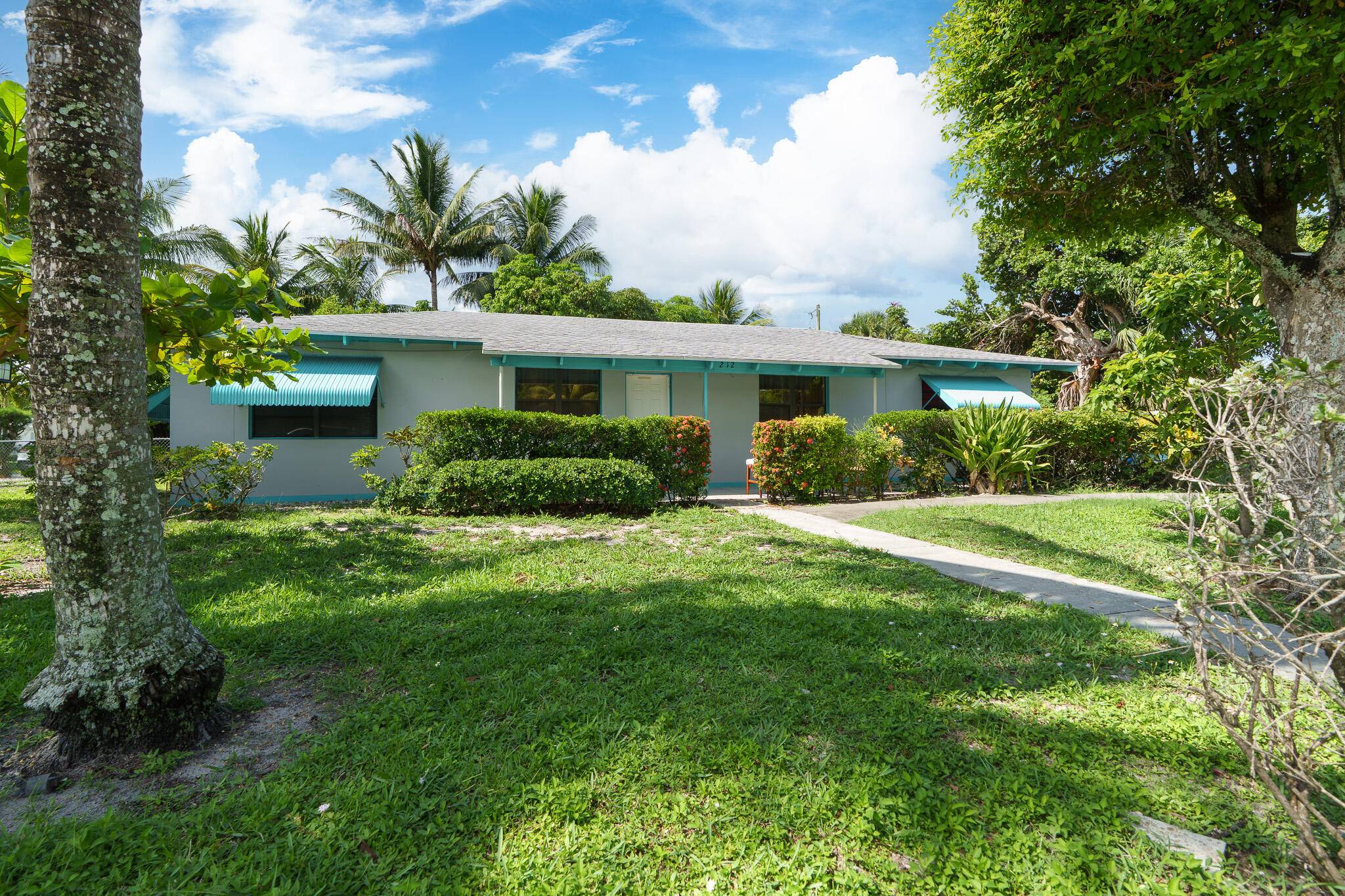 This 4 bed 2 bath ranch home w an attached in law studio, provides nearly 1, 700 Sq Ft under air on a large 11, 000 sq ft corner lot ...