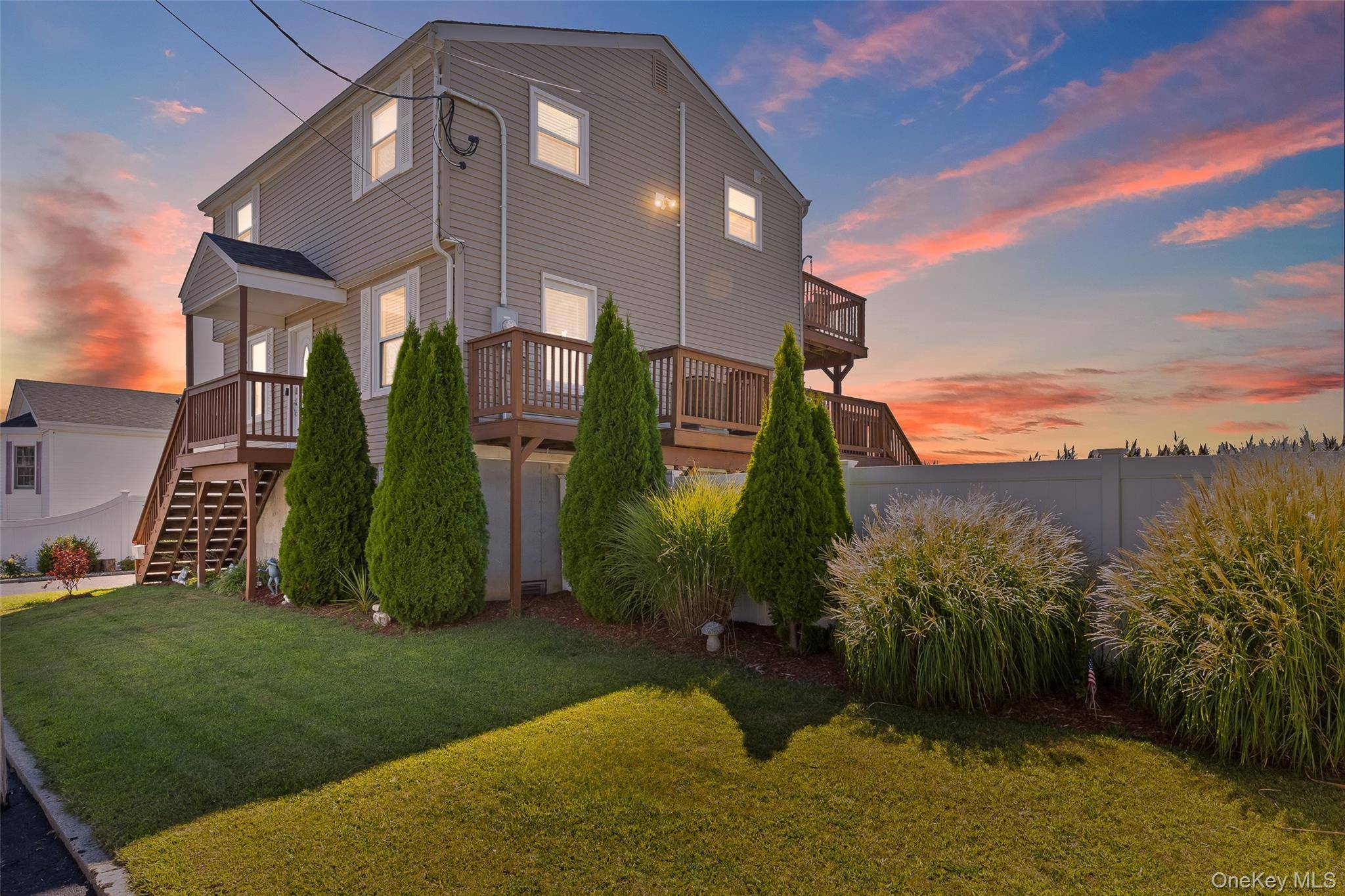 Beautiful Elevated Colonial with Bay Views !