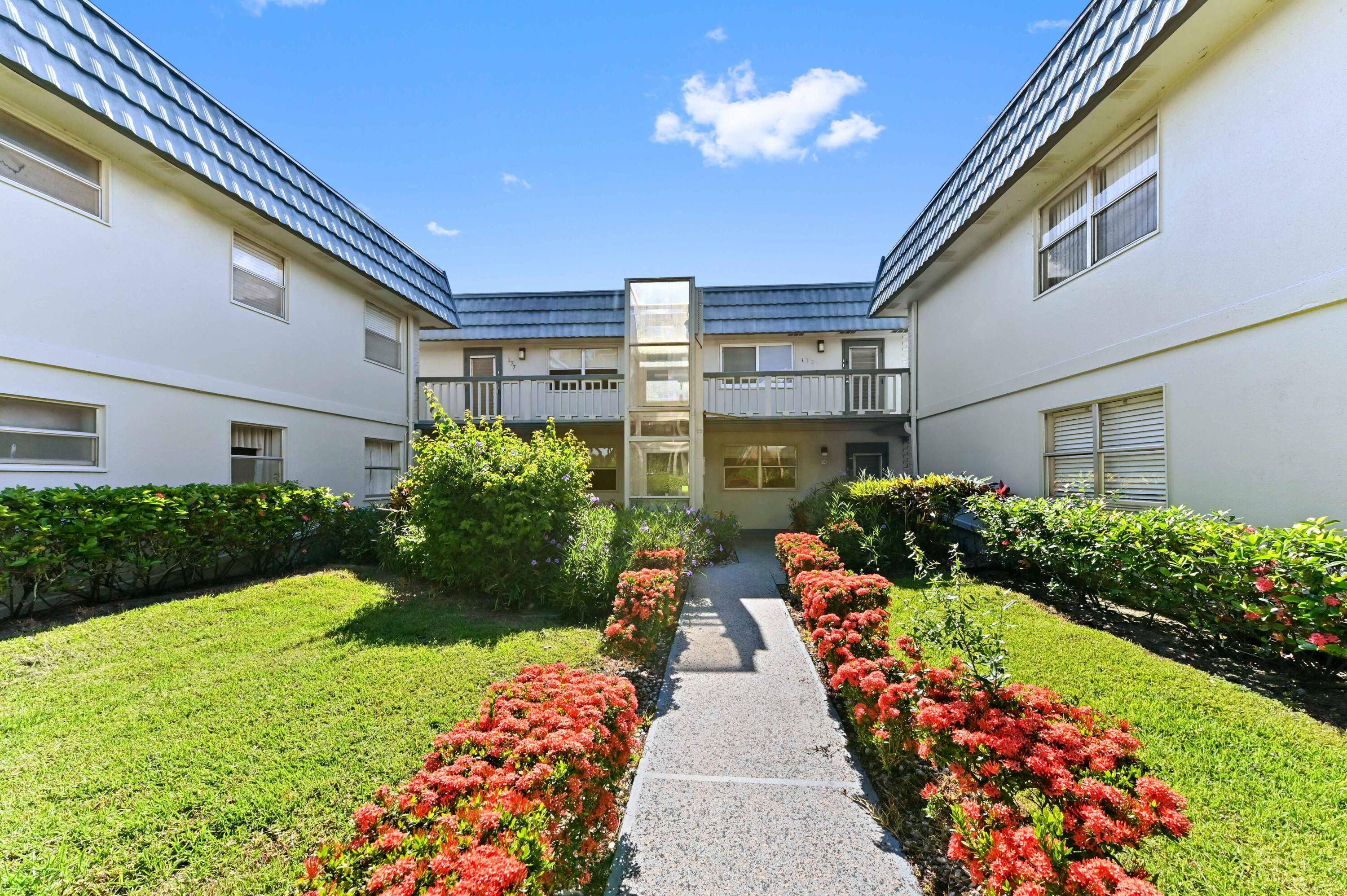 In the vibrant community of Delray Beach, FL, you'll find this exquisite first floor unit bearing the address 154 Tuscany C.