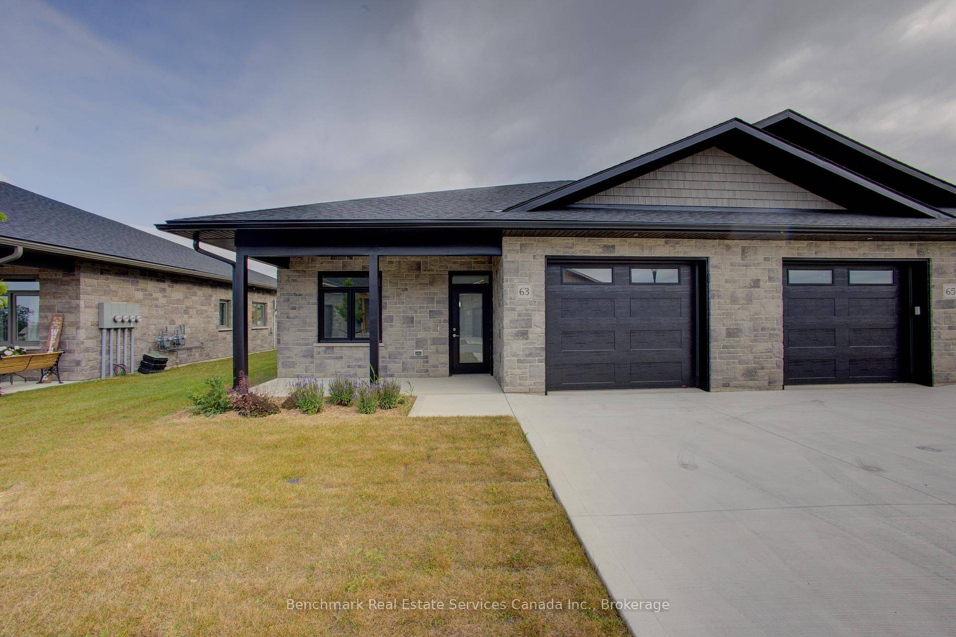 Welcome to easy, carefree living in this beautifully designed 2 bedroom, 2 bathroom end unit bungalow condo, nestled in the quiet and welcoming town of Ripley.