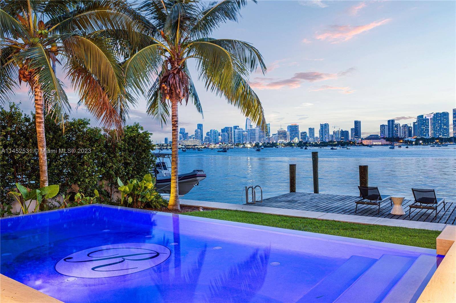 Enjoy unparalleled sunsets and envious Miami skyline views from this striking modern waterfront estate by Choeff Levy Fischman !