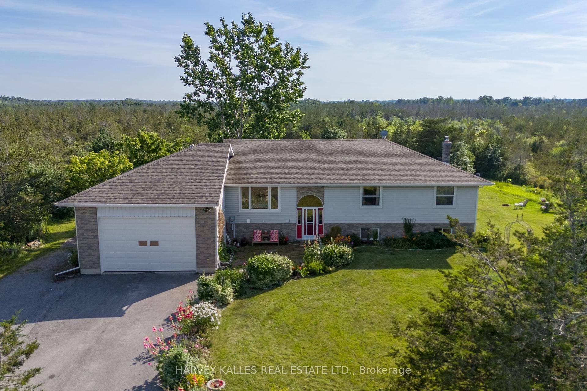 Bright and spacious, this inviting raised bungalow offers over 1800 sq ft of living space, and the tranquility of a quiet rural location.