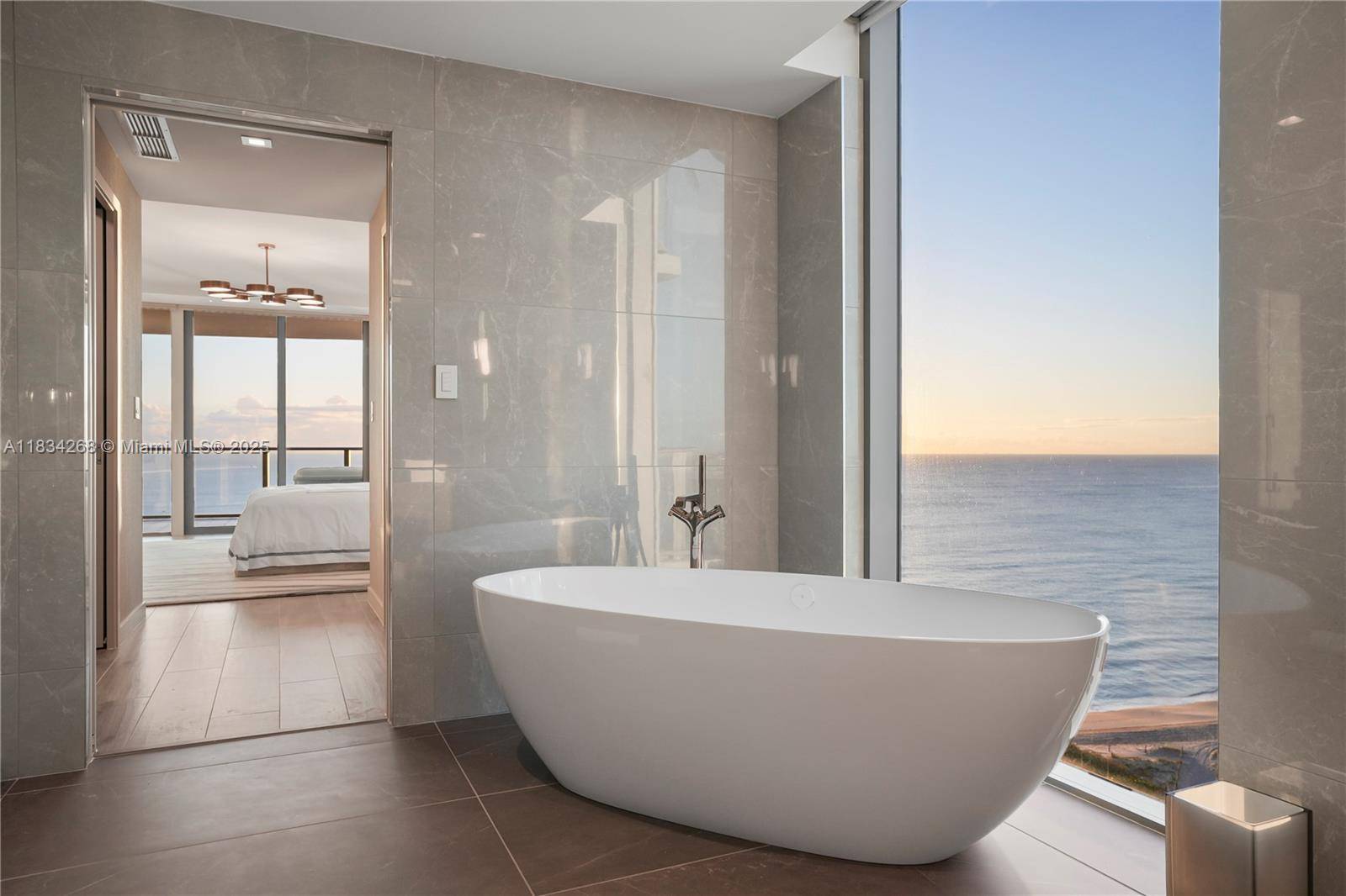 Southeast corner unit on the 15th floor with direct east ocean views and west facing sunset views.
