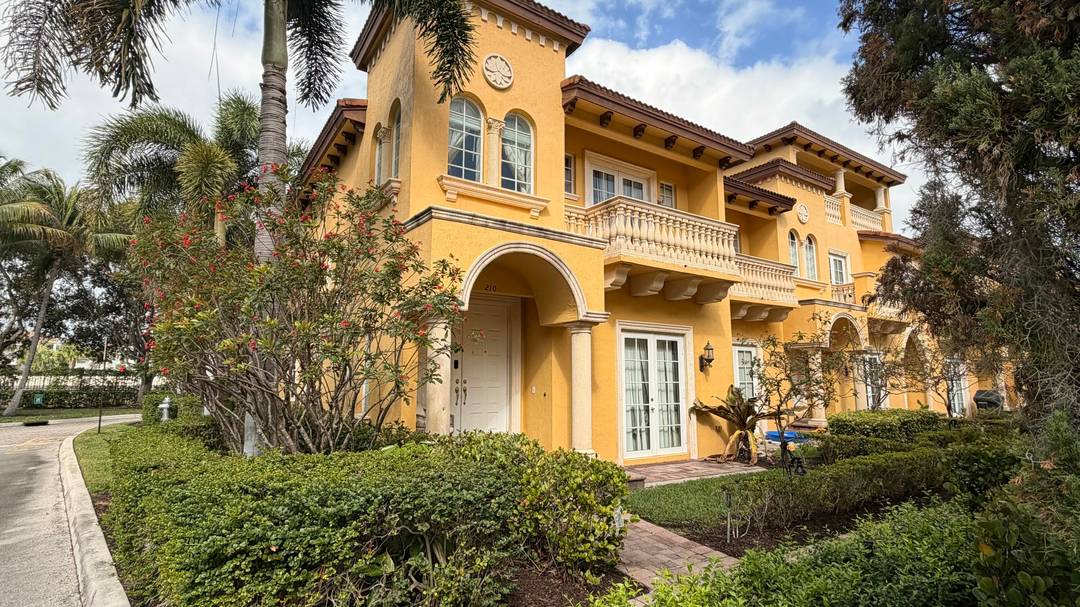 Beautiful Mediterranean Townhome in Gated Community 1 of only a few corner units, Minutes to Downtown amp ; the Beach.